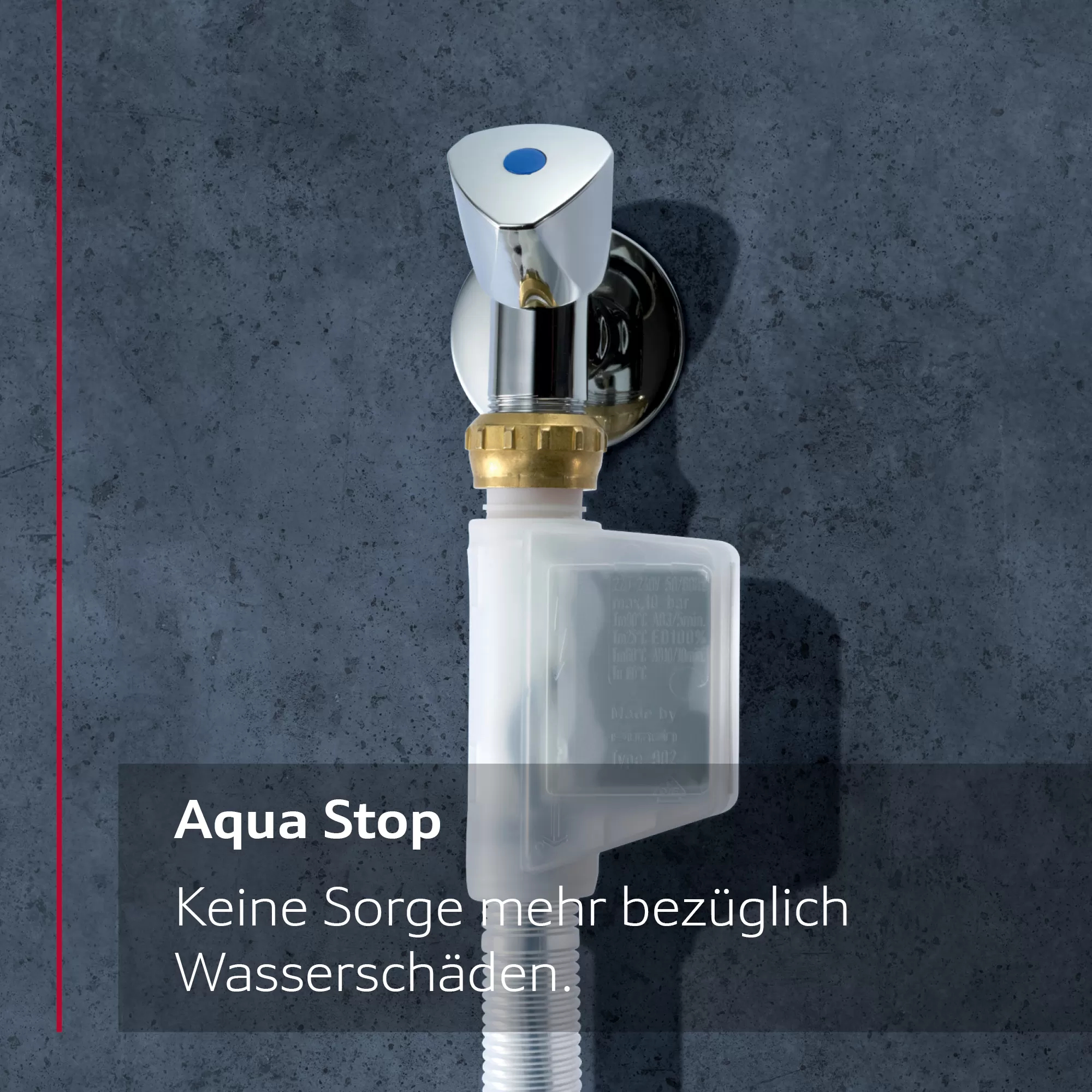 Aqua Stop Wassersicherheitsgerät mit Chromarmatur. Text an der Wand lautet 'Aqua Stop'.
