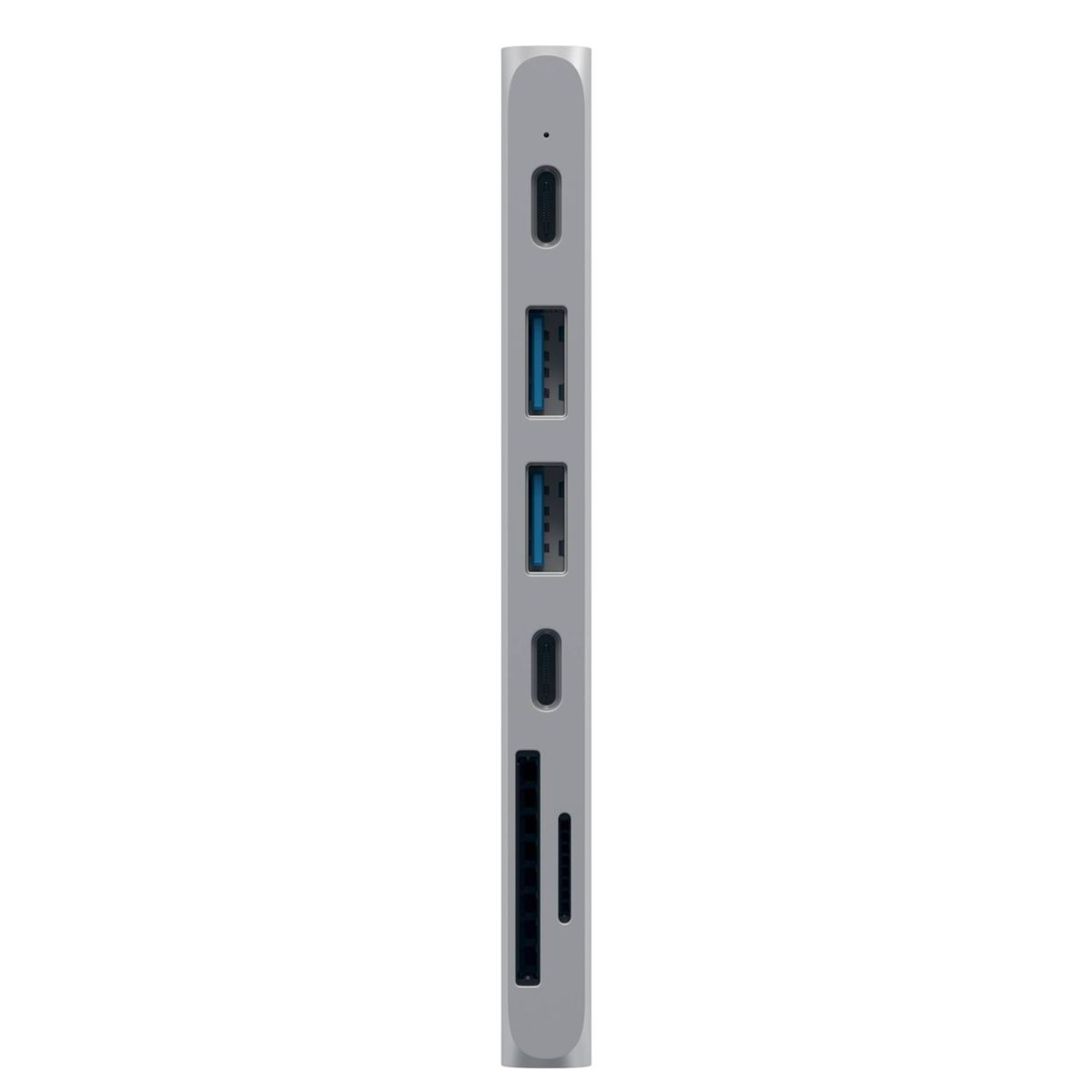 A silver USB-C hub connected to a laptop, with accessories: SSD, USB drives.