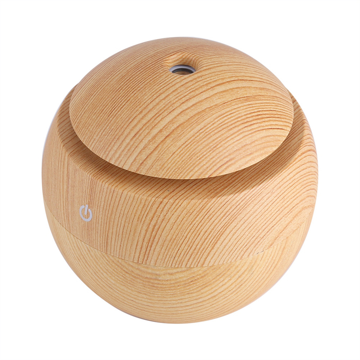 Ein ätherisches Öl-Diffusor aus Holz. Runde Form mit offenem Deckel.