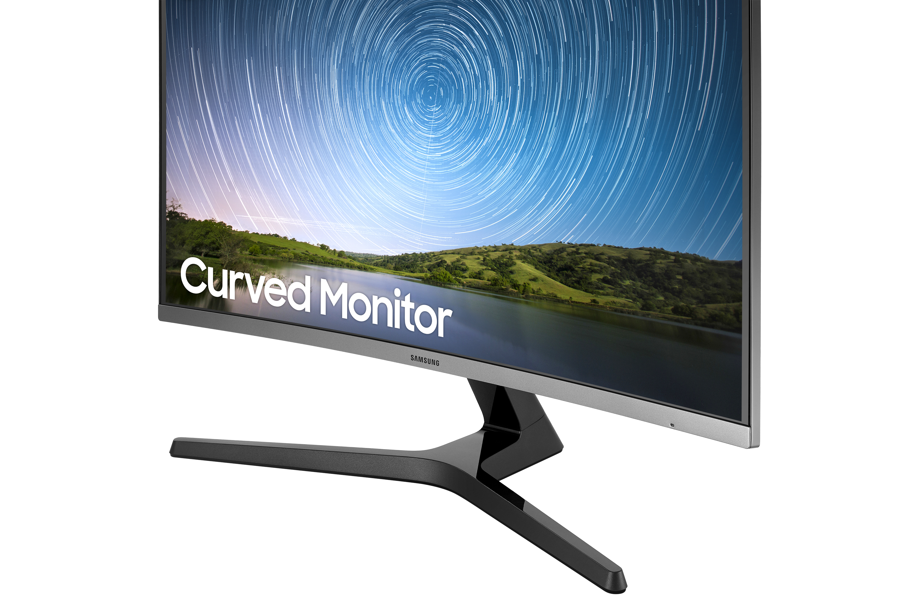 Zakrzywiony monitor wyświetla gwiaździste niebo nad krajobrazem z napisem 'Curved Monitor'.