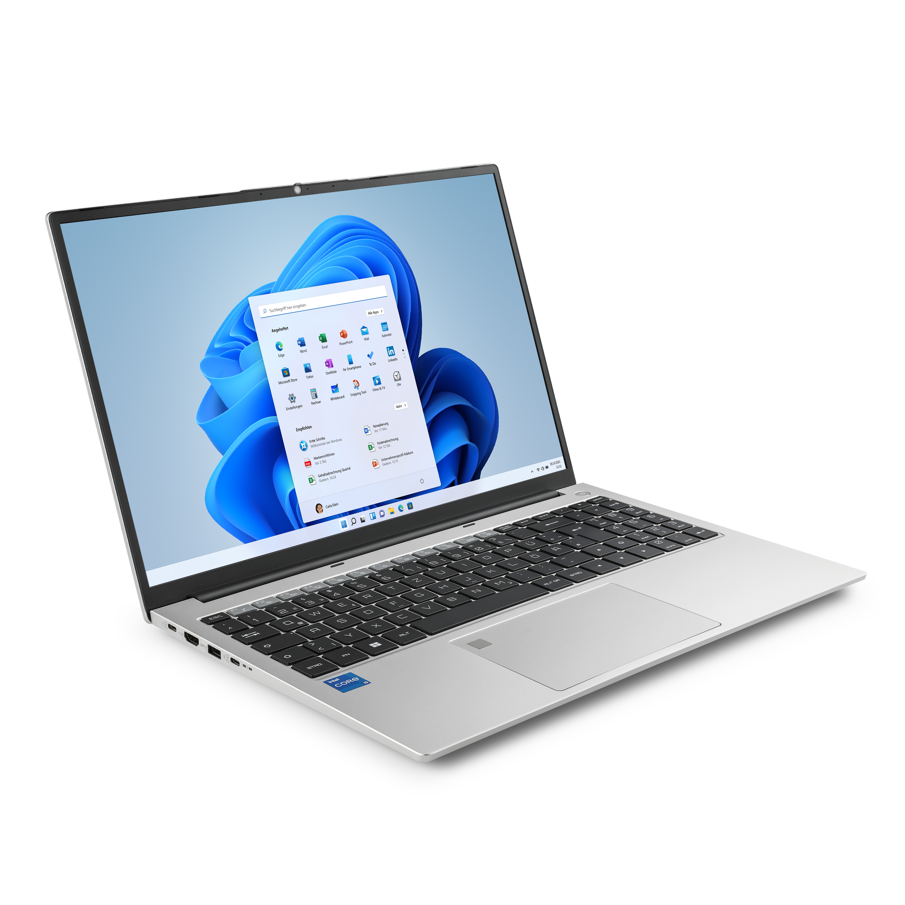 Ordinateur portable argenté avec une interface Windows ouverte. Il est incliné sur une surface blanche.