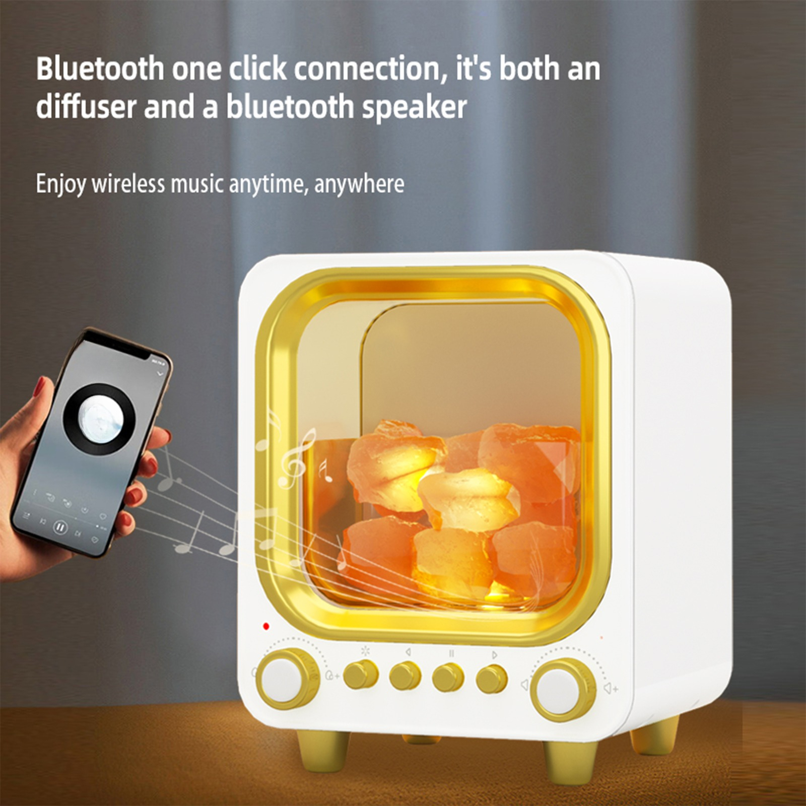 Ein weiß-goldener Diffusor mit Smartphone und Noten. Es ist ein Diffusor und ein Lautsprecher.
