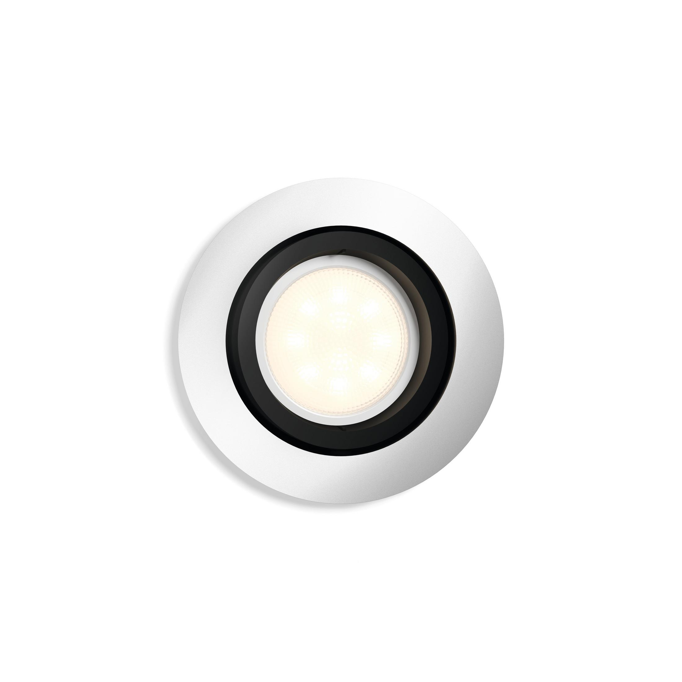 Applique encastrée blanche avec anneau intérieur noir. La source lumineuse est un groupe de LED chaudes.