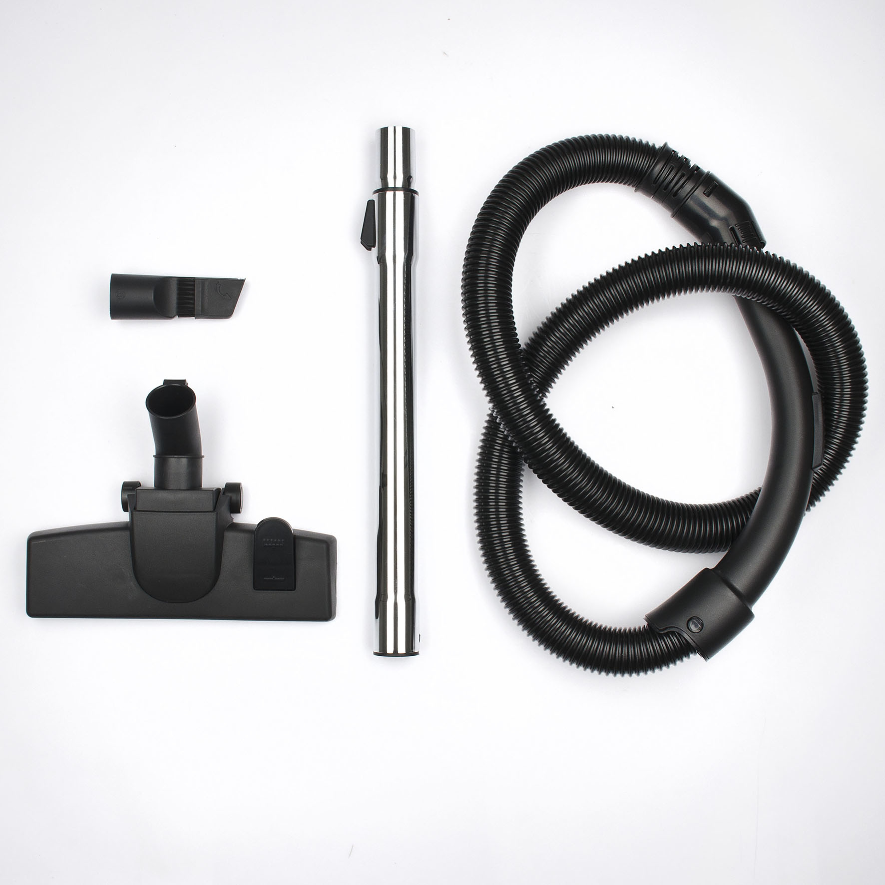 Akcesoria do odkurzacza. Zawiera szczotkę, dyszę i wąż.