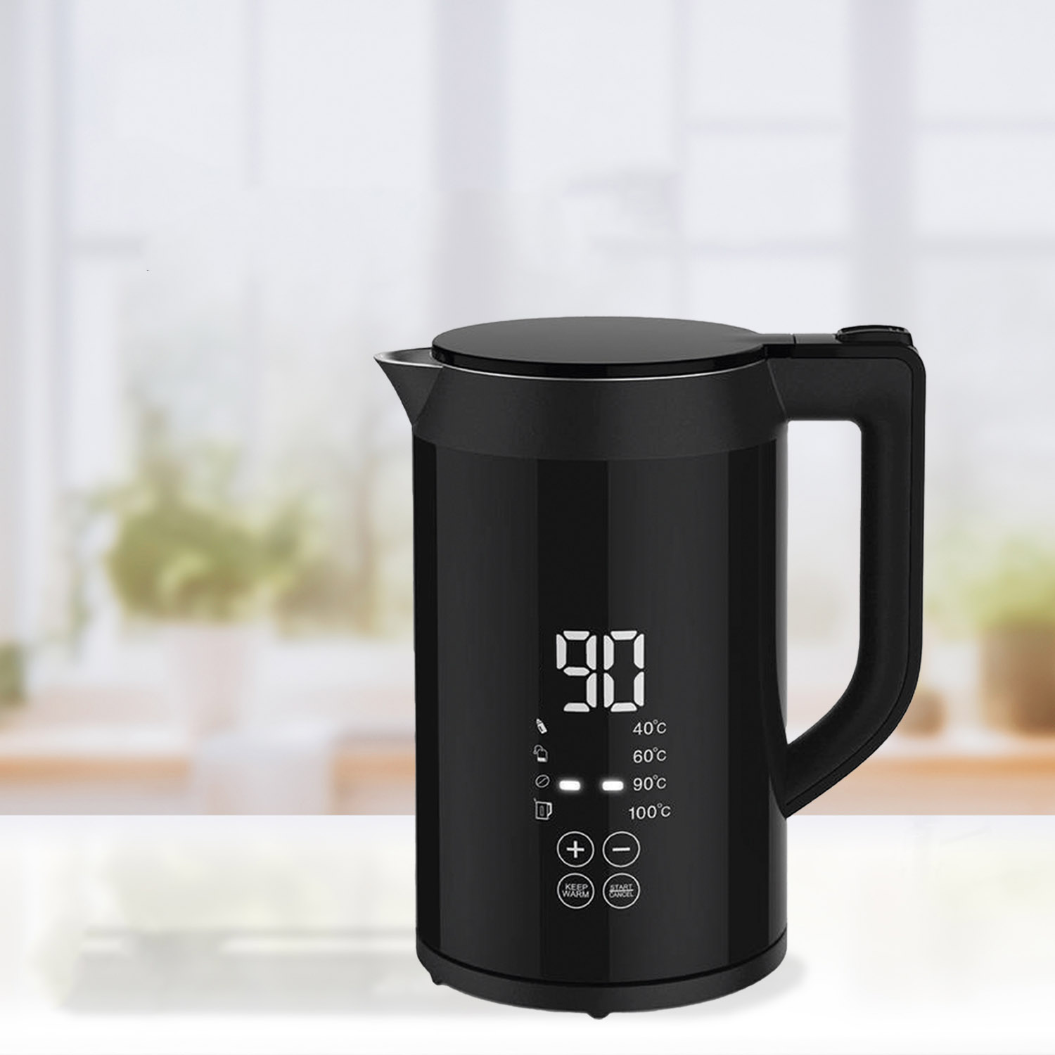 Black kettle on white counter, digital display showing 90, blurred kitchen background.