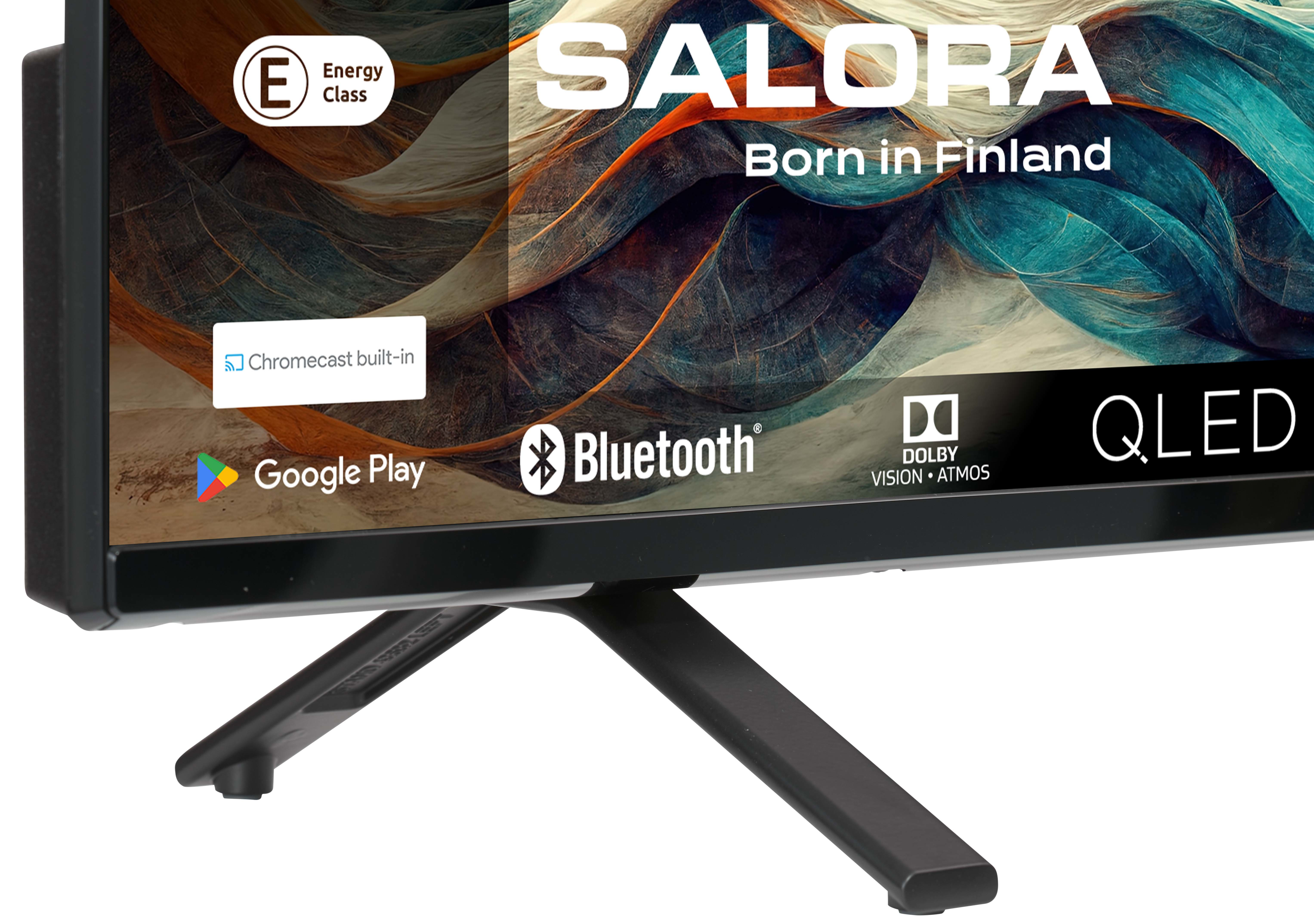 Uno schermo TV mostra forme astratte colorate.