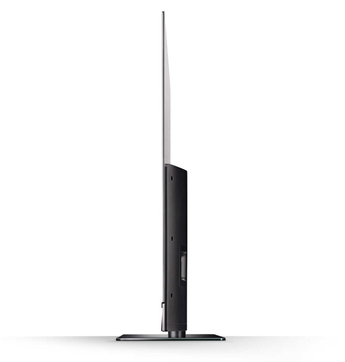 Una TV vista di lato, è nera e sottile, con una base rettangolare. Lo schermo è quasi invisibile.