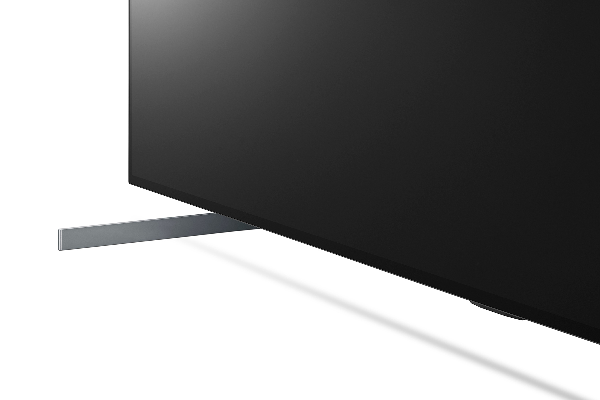 Nahaufnahme eines modernen TV-Ständers auf weißem Hintergrund, der sein schlankes Design hervorhebt.