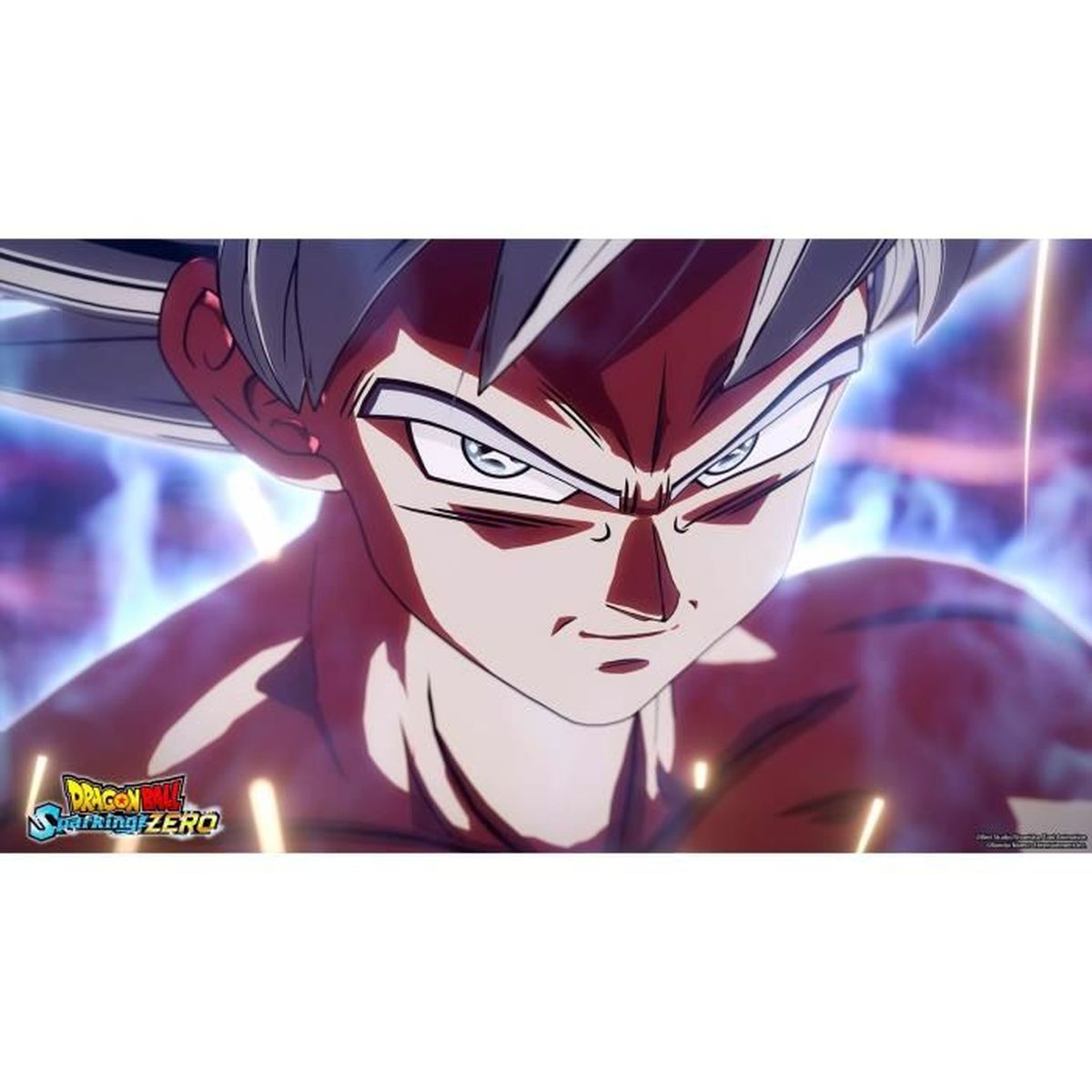 Primo piano di un personaggio di Dragon Ball, un uomo con i capelli bianchi, espressione concentrata e aura blu.
