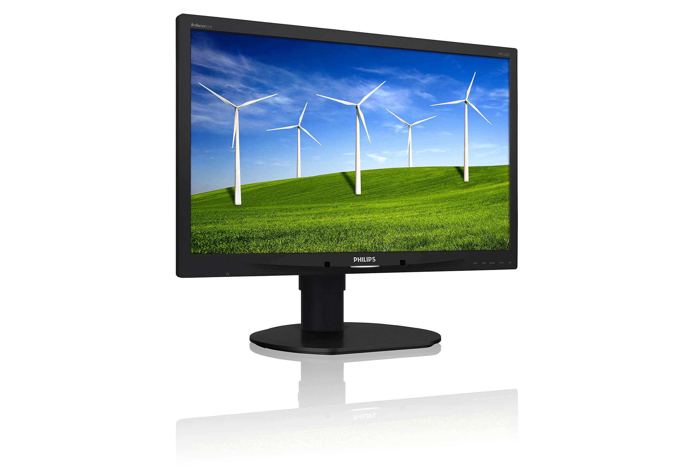 Monitor Philips con mulini a vento su campo verde sotto cielo blu.