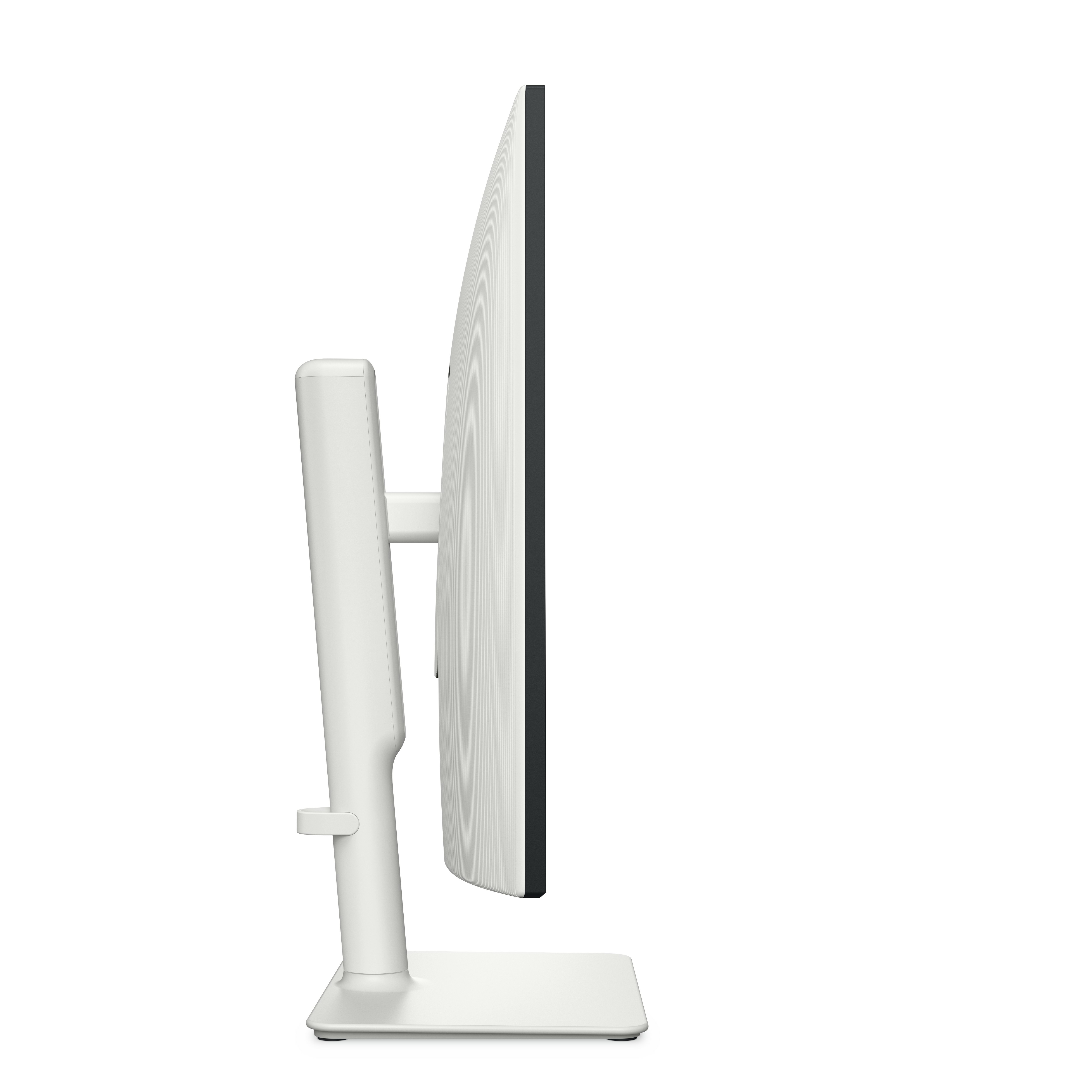 Widok z boku białego monitora z białą podstawą.