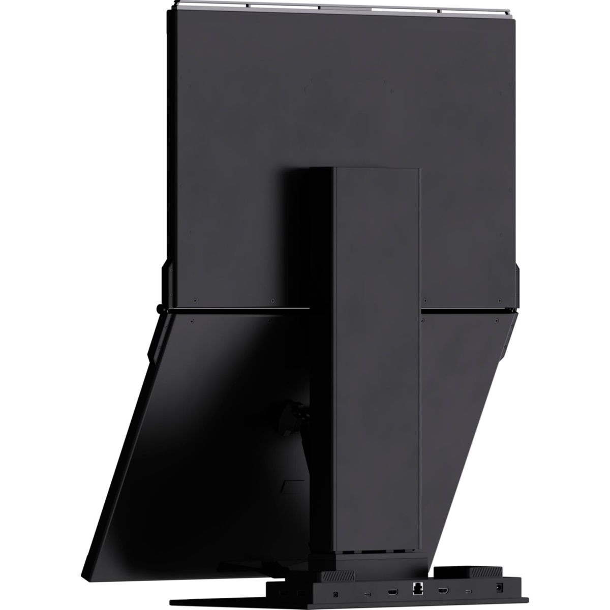 Parte trasera de un gran monitor negro. Tiene un soporte y una base con puertos.