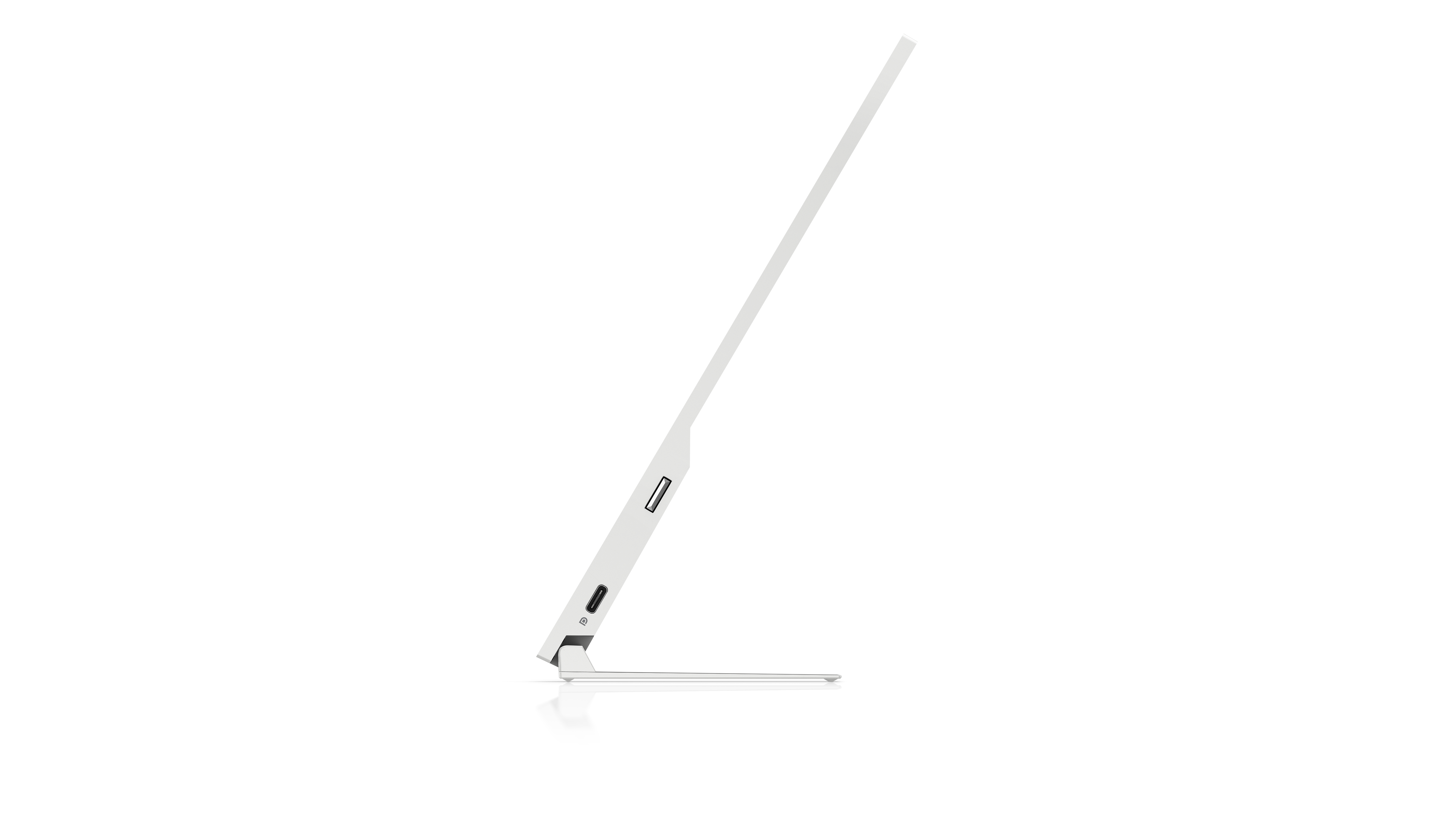 Laptop bianco, visto lateralmente, mostra porte e schermo inclinato.