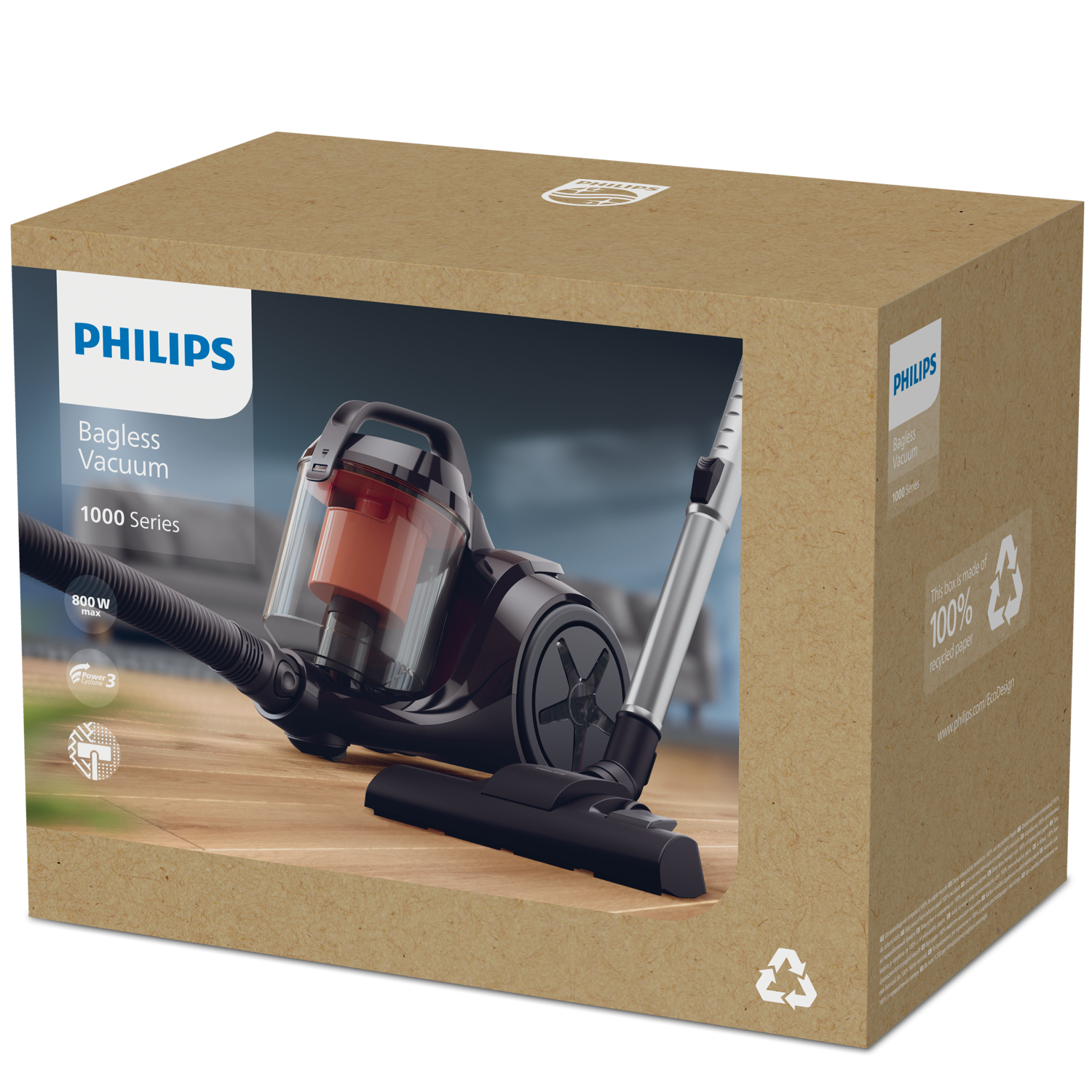 A Philips bagless vacuum cleaner in its cardboard box, showing the product and brand details.