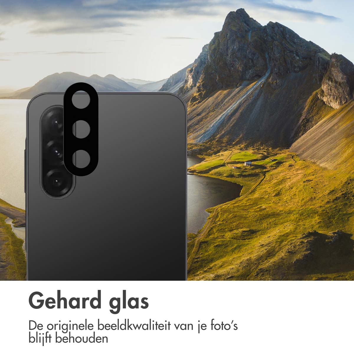 Téléphone avec protecteur d'objectif et fond de montagne. Texte en néerlandais.