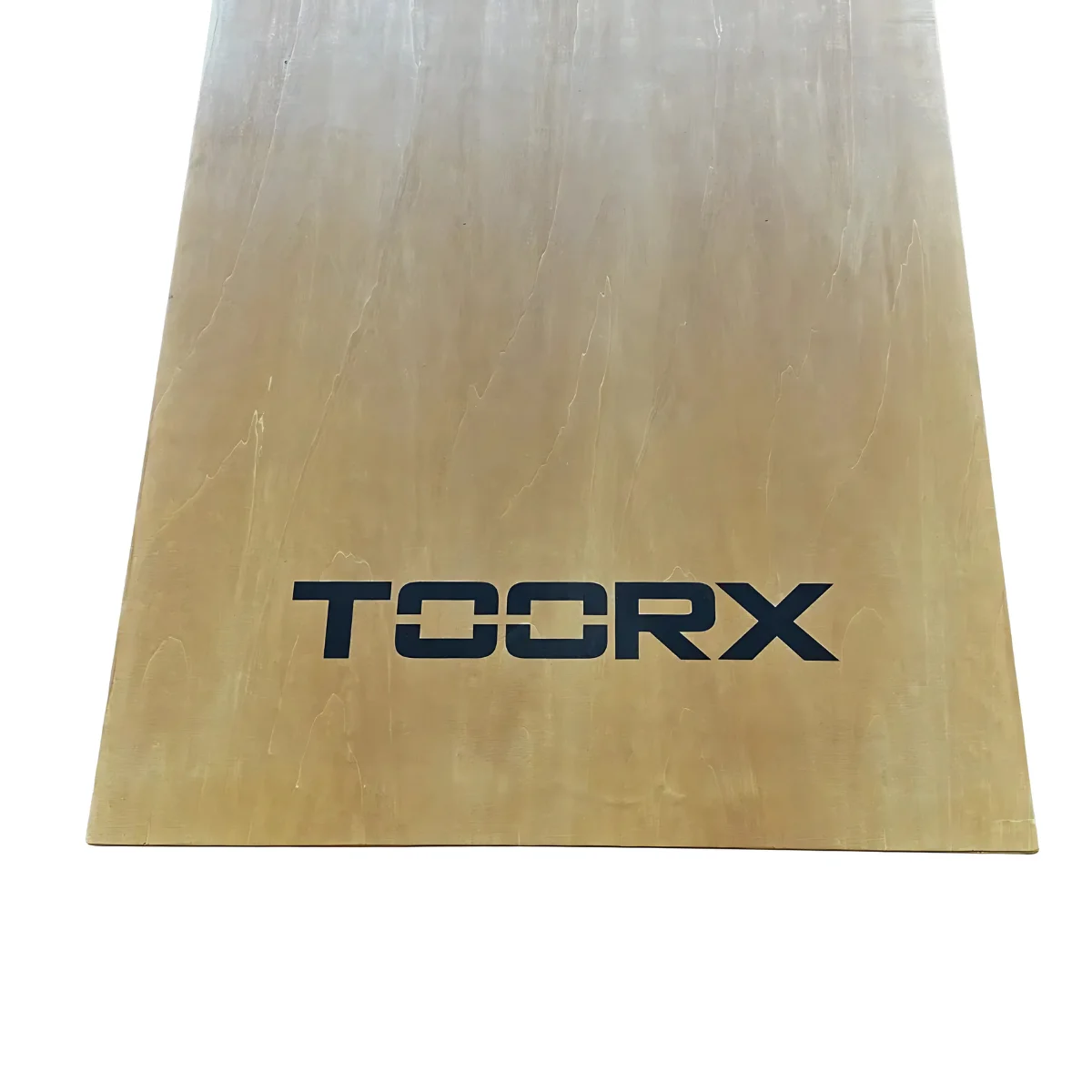 Planche de bois avec texte noir 'TOORX'.