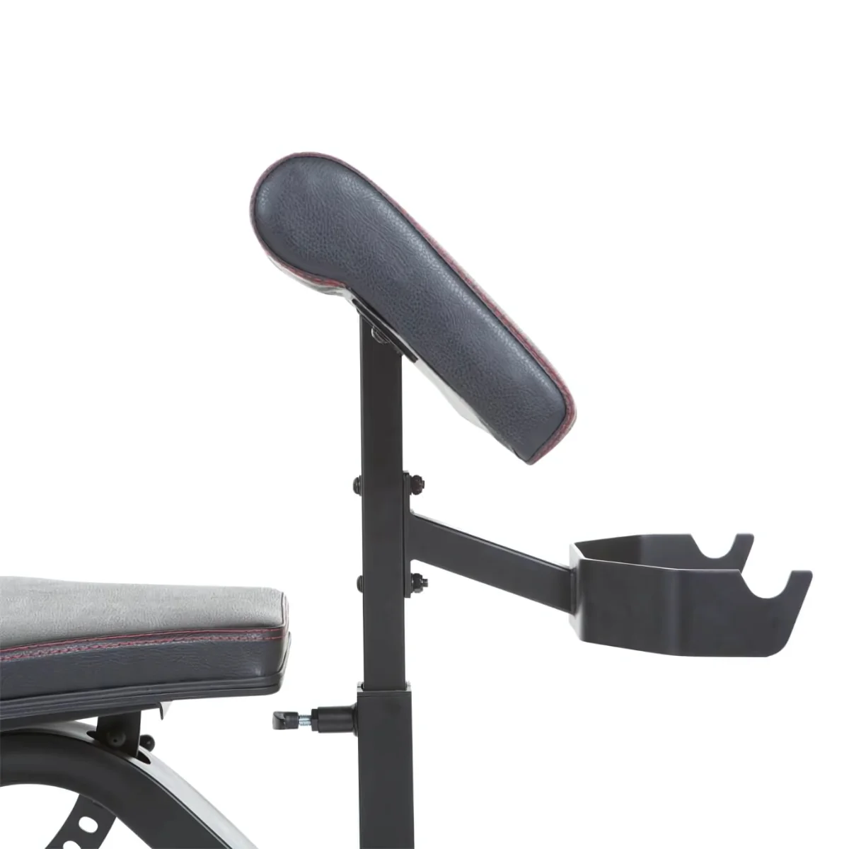 Weight bench with black frame and a gray and red cushion. The bench is isolated on white.