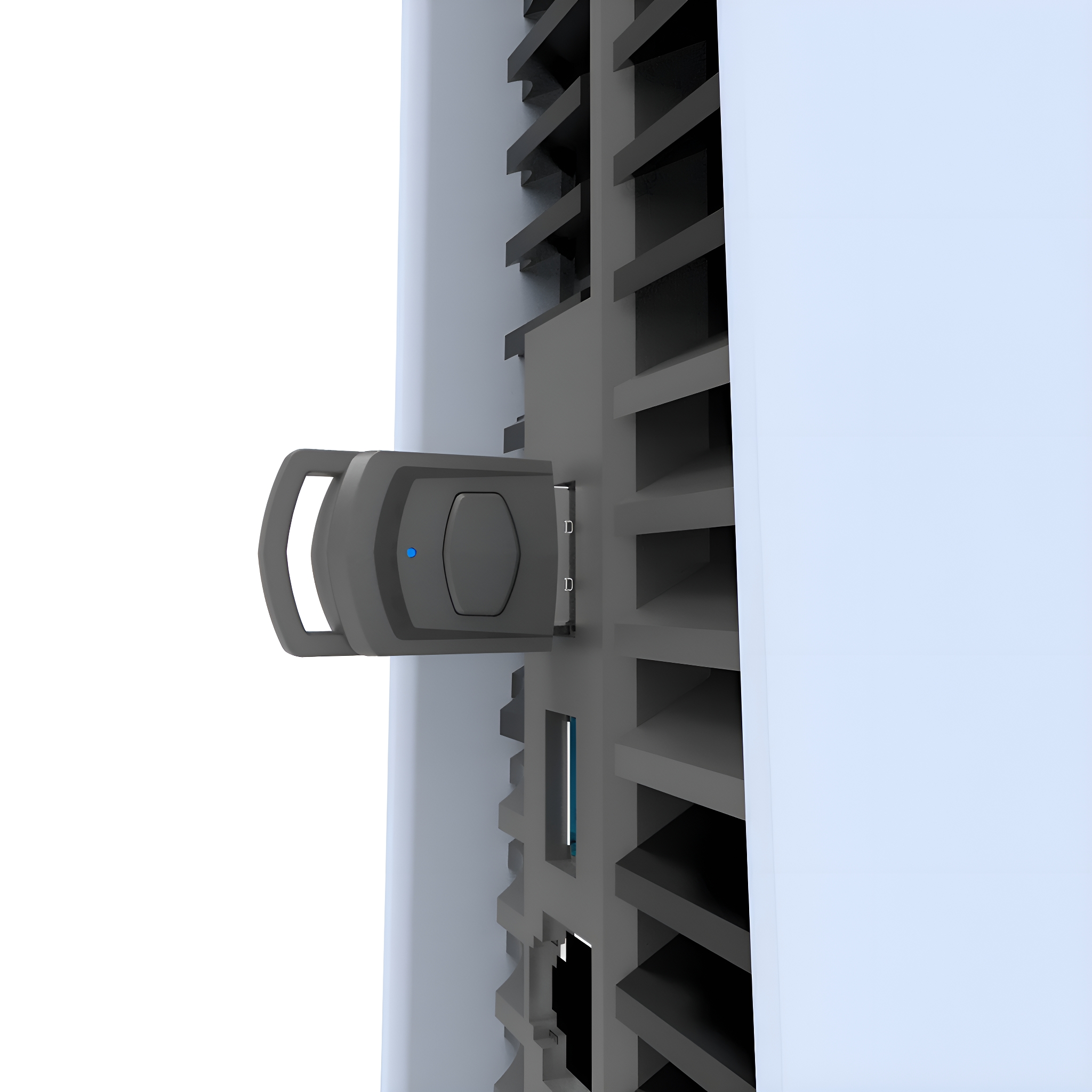 Ein graues USB-Gerät, das in eine weiße Spielekonsole eingesteckt ist. Die Konsole ist weiß und grau.