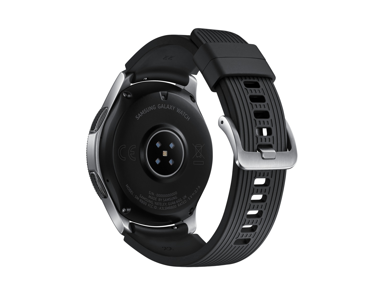 Nahaufnahme einer schwarzen und silbernen Samsung Galaxy Watch auf weißem Hintergrund, Rückseite nach oben, Armband angebracht.