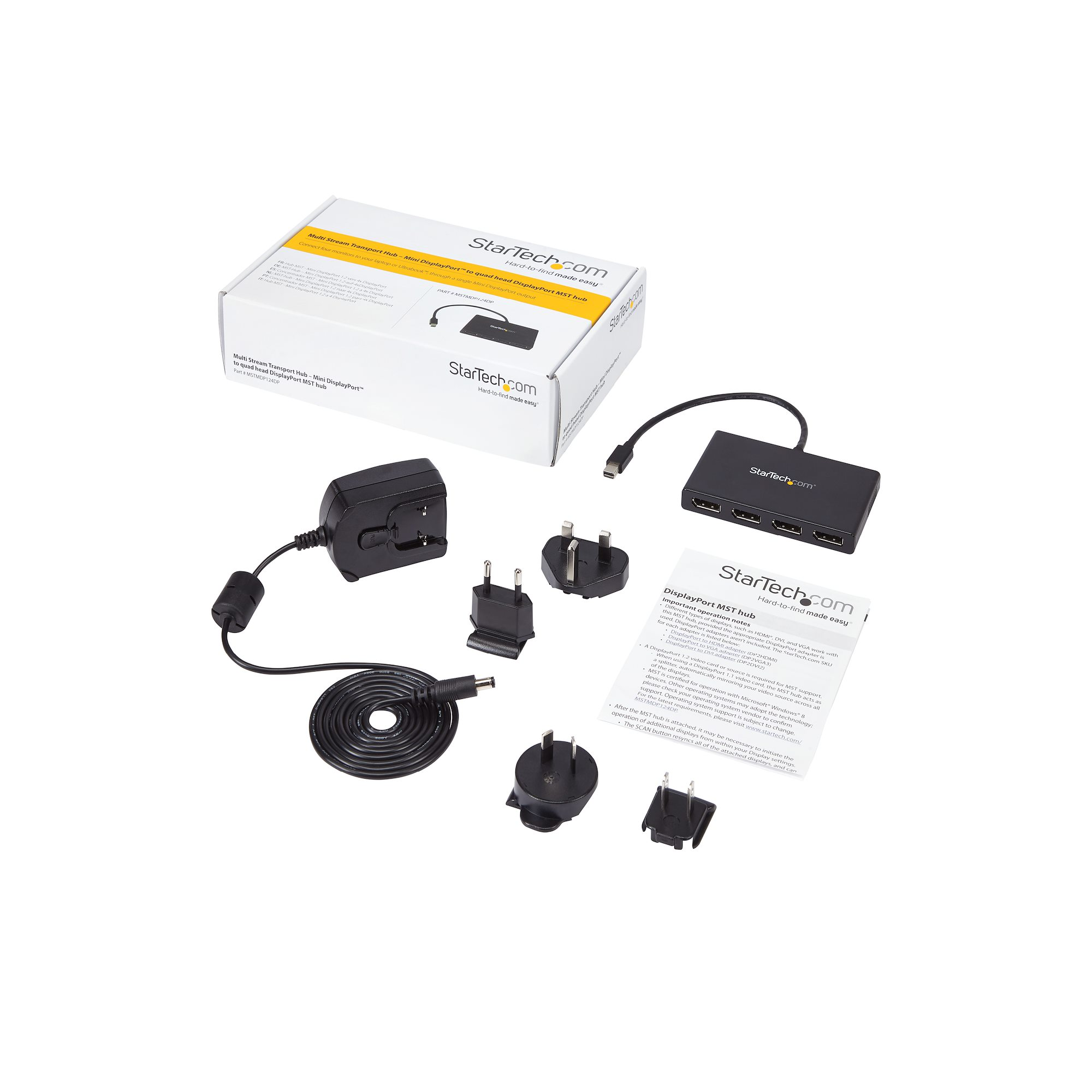 Un conjunto de adaptadores eléctricos y un concentrador DisplayPort en caja blanca.