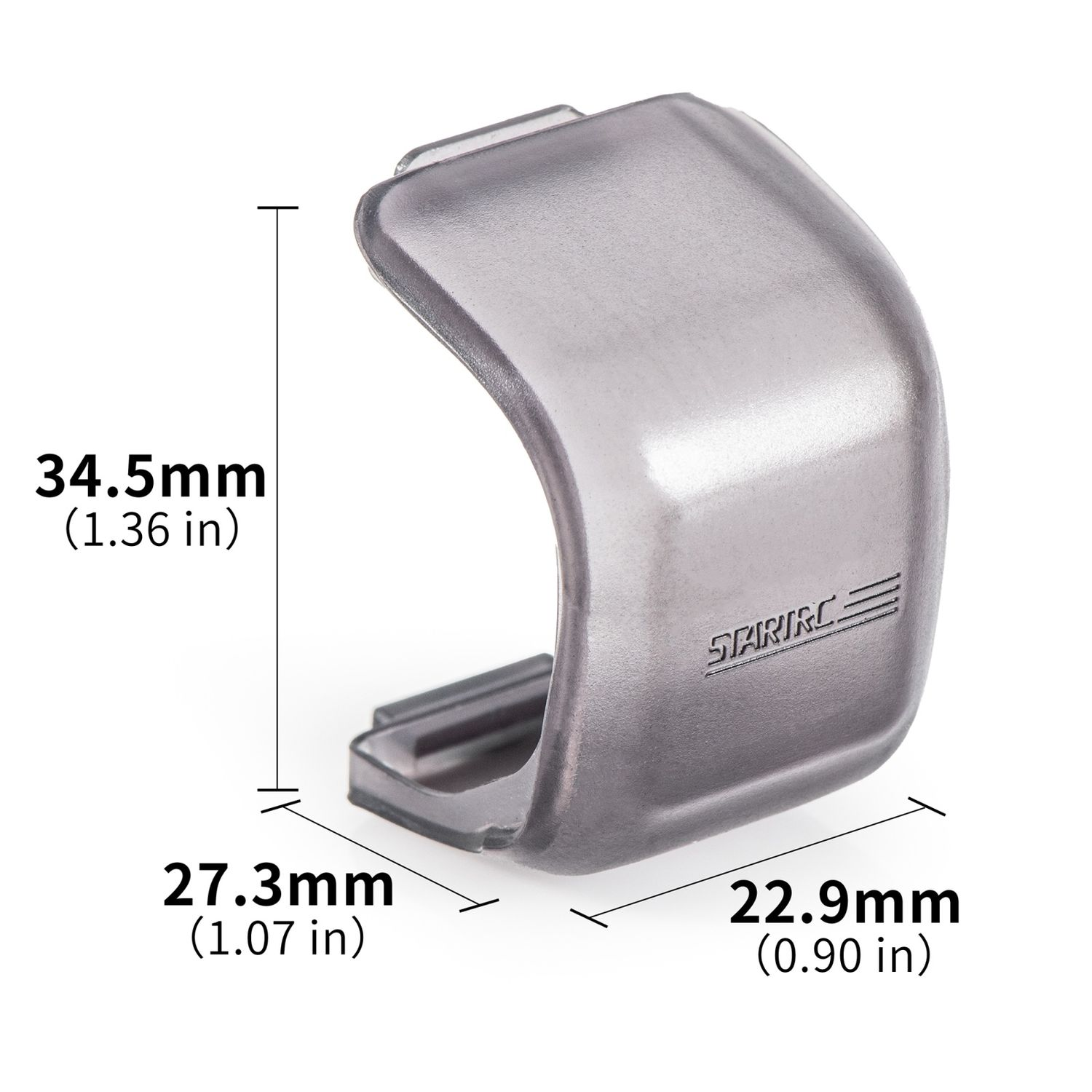 Ein graues Kunststoffobjekt mit den Maßen 34,5 mm x 27,3 mm x 22,9 mm.