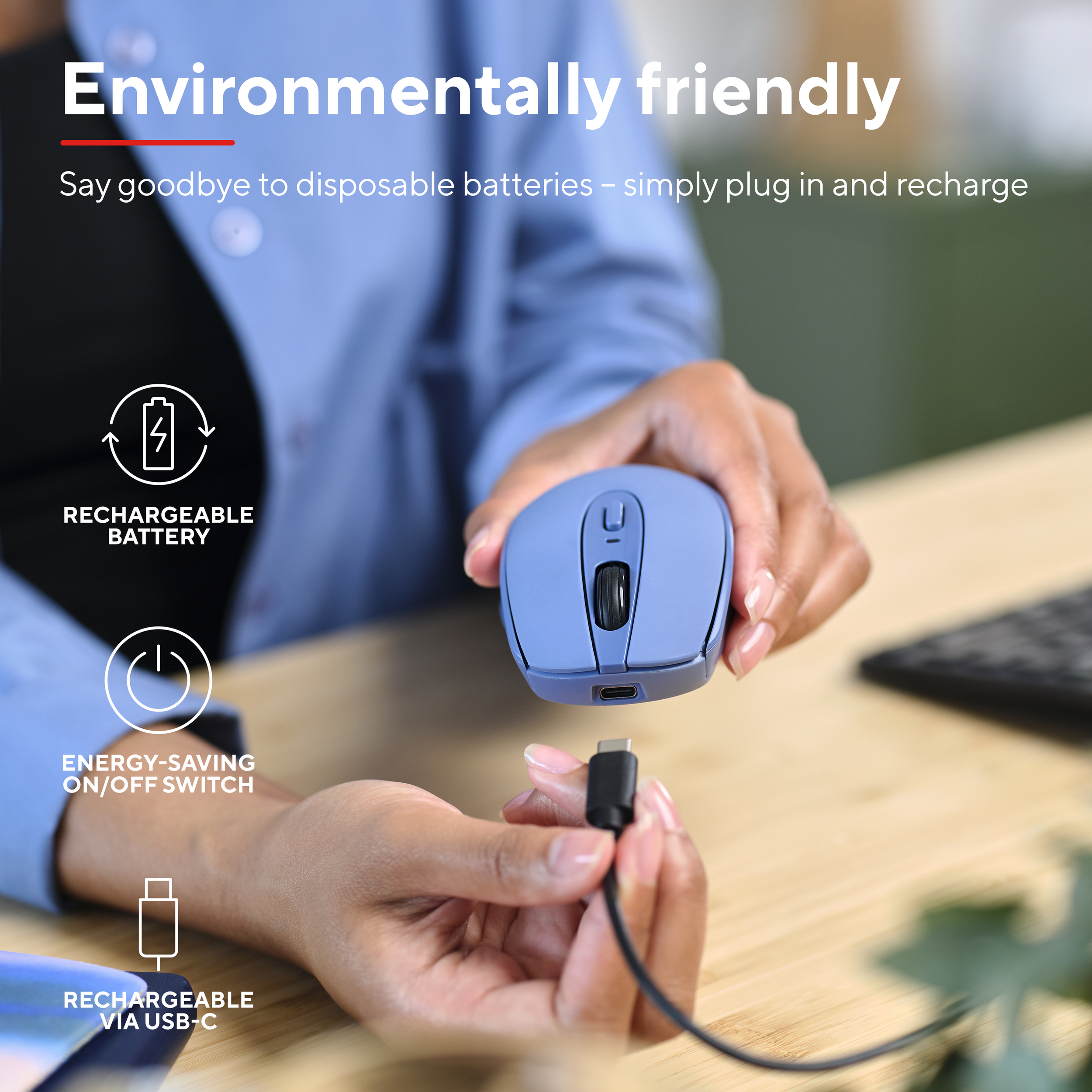A person holding a blue mouse with a USB-C cable and text about battery.