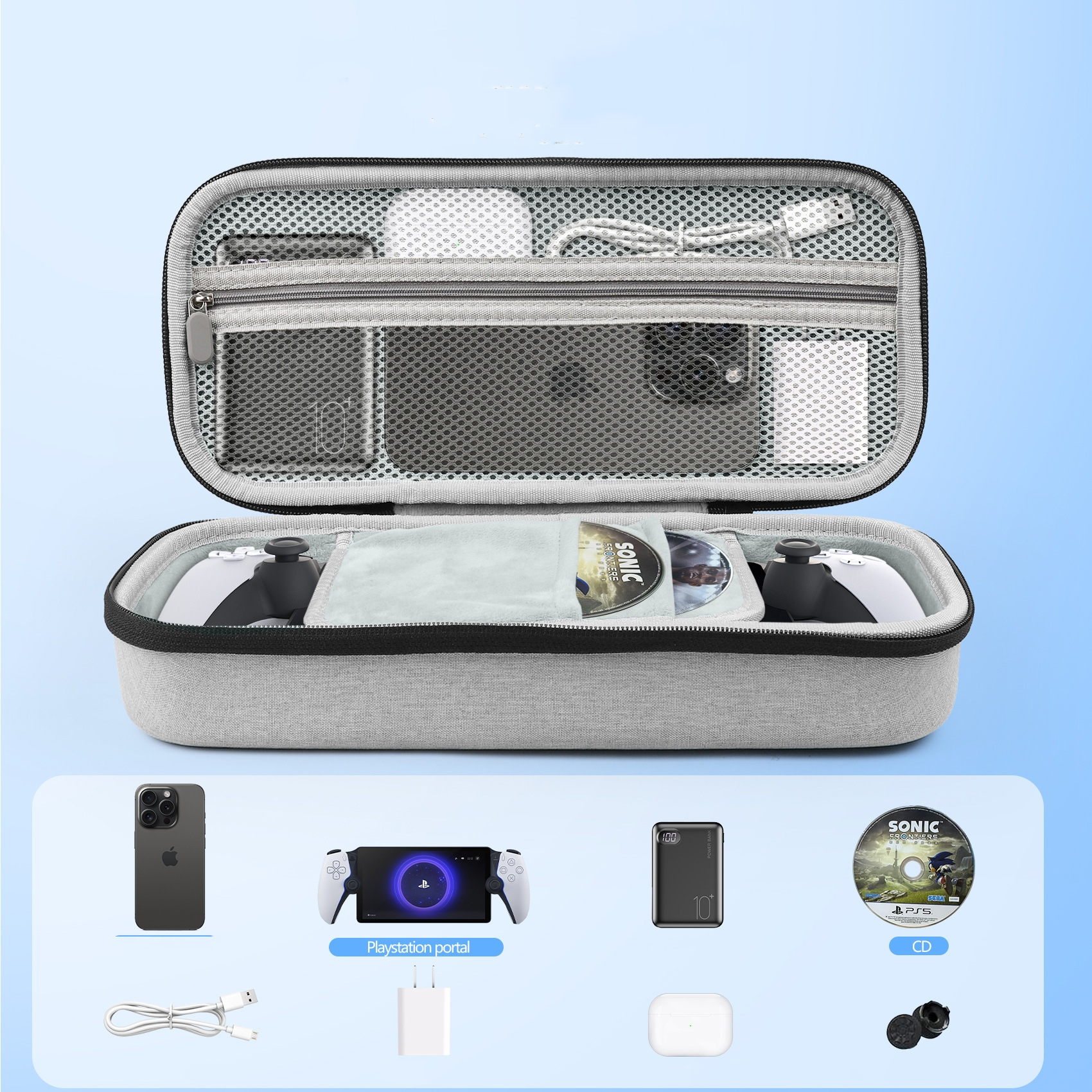 Otwarta szara walizka z konsolą do gier, grami, telefonem, ładowarką i akcesoriami.