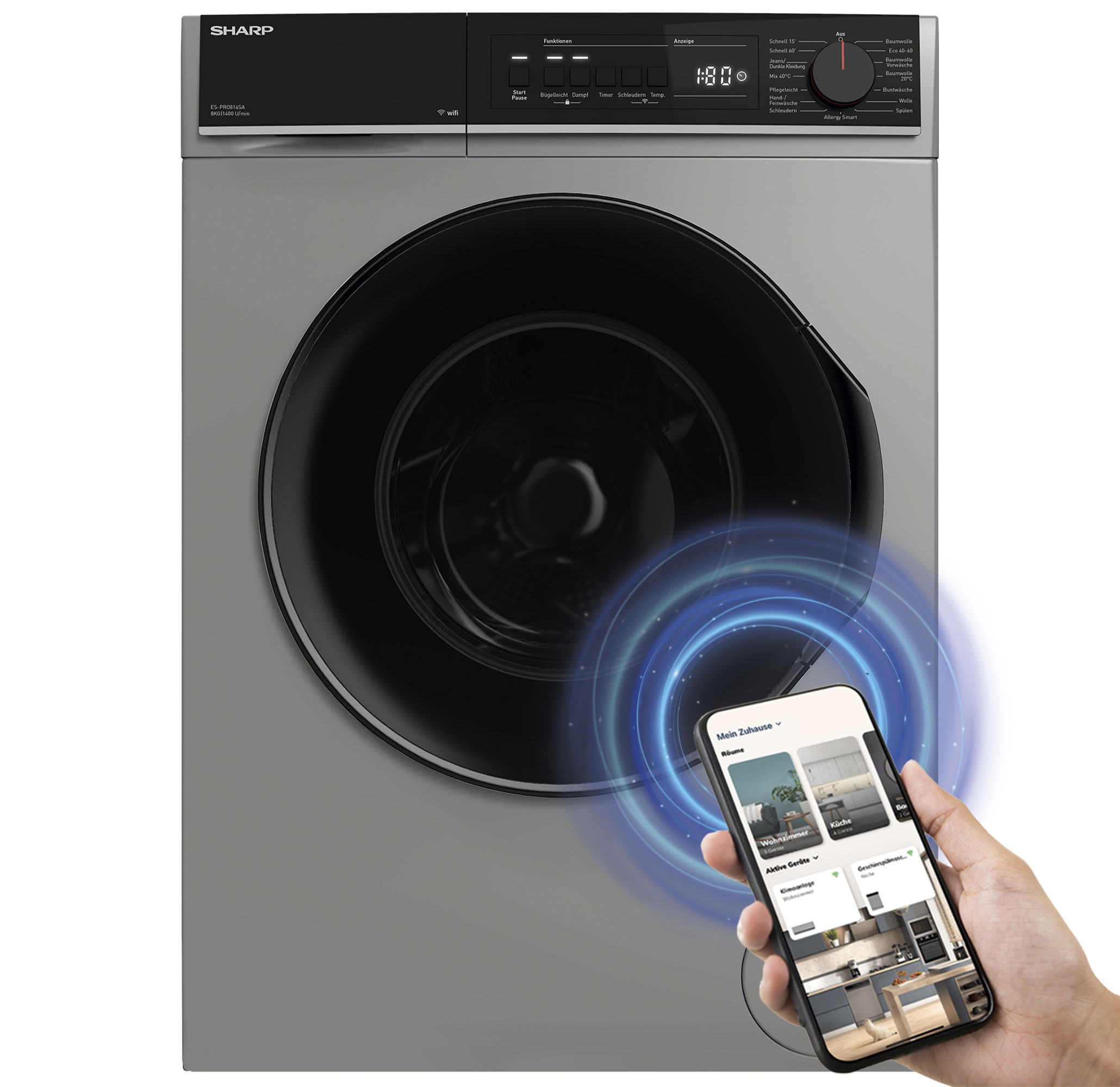 Waschmaschine mit Telefon, das Smart-Home-Funktionen anzeigt. Silbernes Gerät mit schwarzer Tür, Hand hält Telefon.