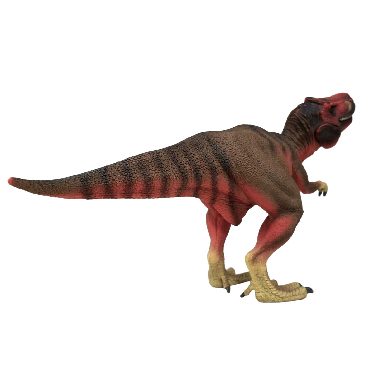 Un giocattolo di dinosauro T-Rex marrone e rosso, in piedi su due zampe.