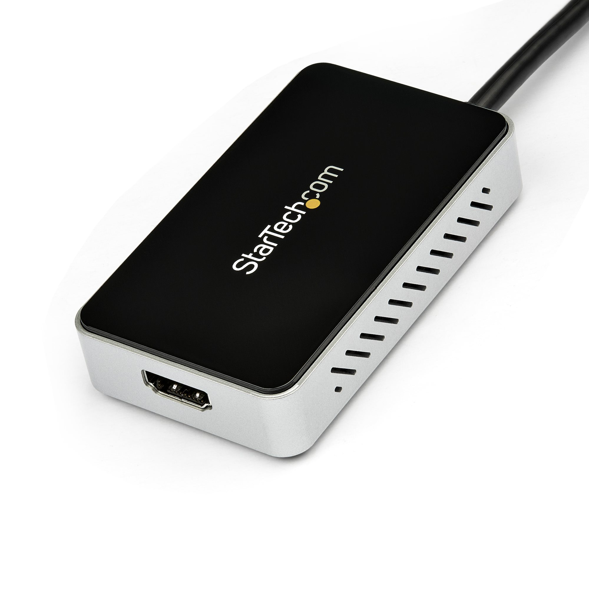 Un adattatore StarTech.com nero e argento. È rettangolare con porte e il nome del marchio.
