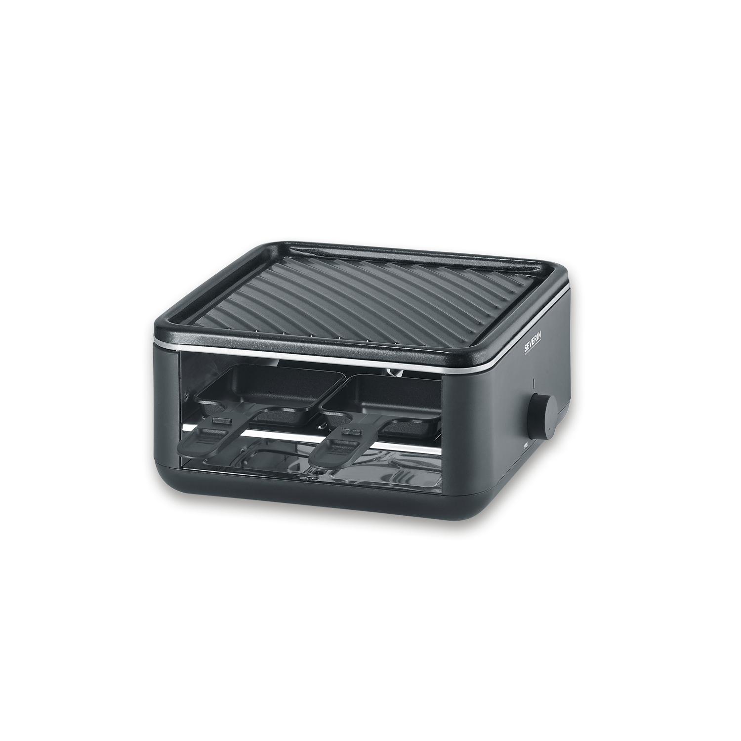 Grill do raclette z dwiema patelniami i czarną powierzchnią do gotowania.