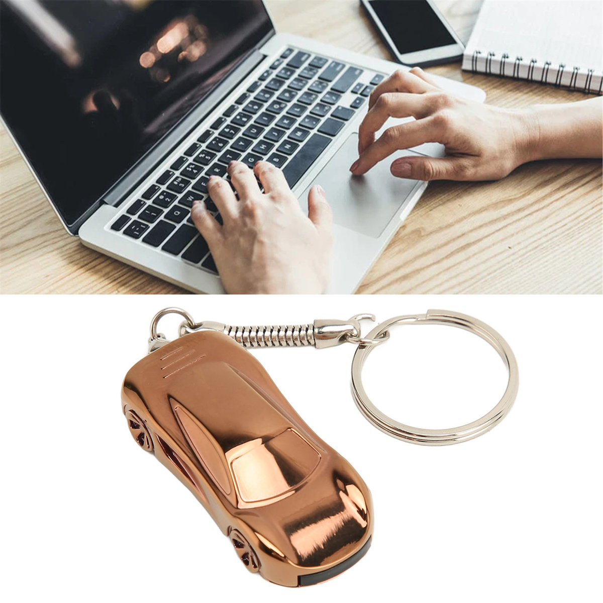 Eine Person, die auf einem Laptop tippt und einen Autoschlüsselanhänger.
