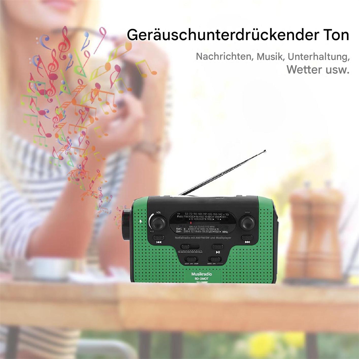 Ein grün-schwarzes Radio mit einer Frau im Hintergrund, mit Noten.
