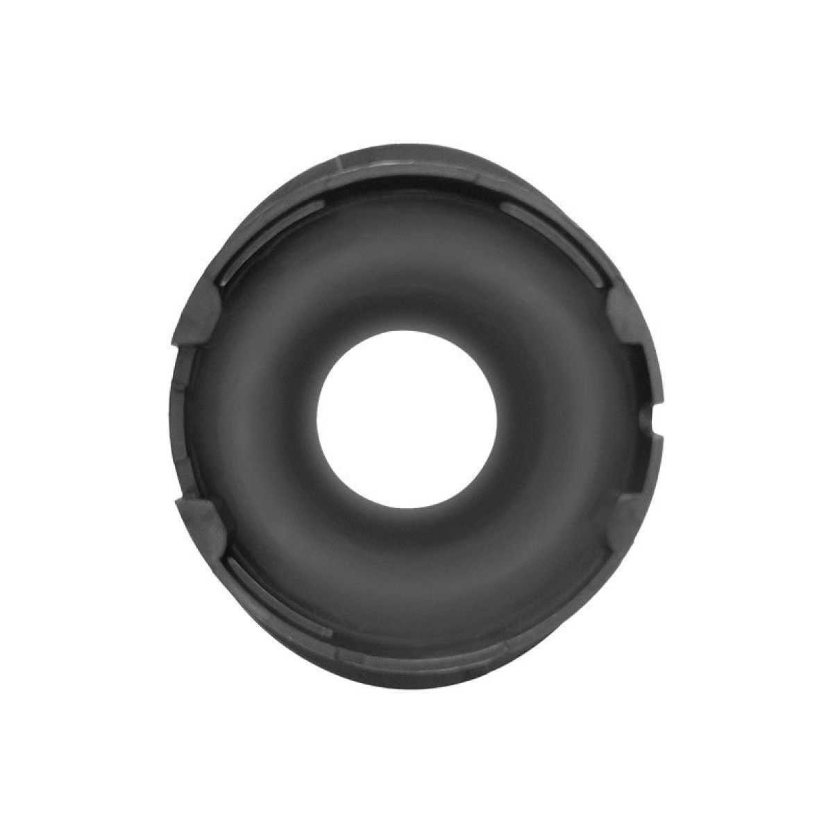 Czarny, okrągły obiekt z centralnym otworem. Ma teksturowaną powierzchnię.