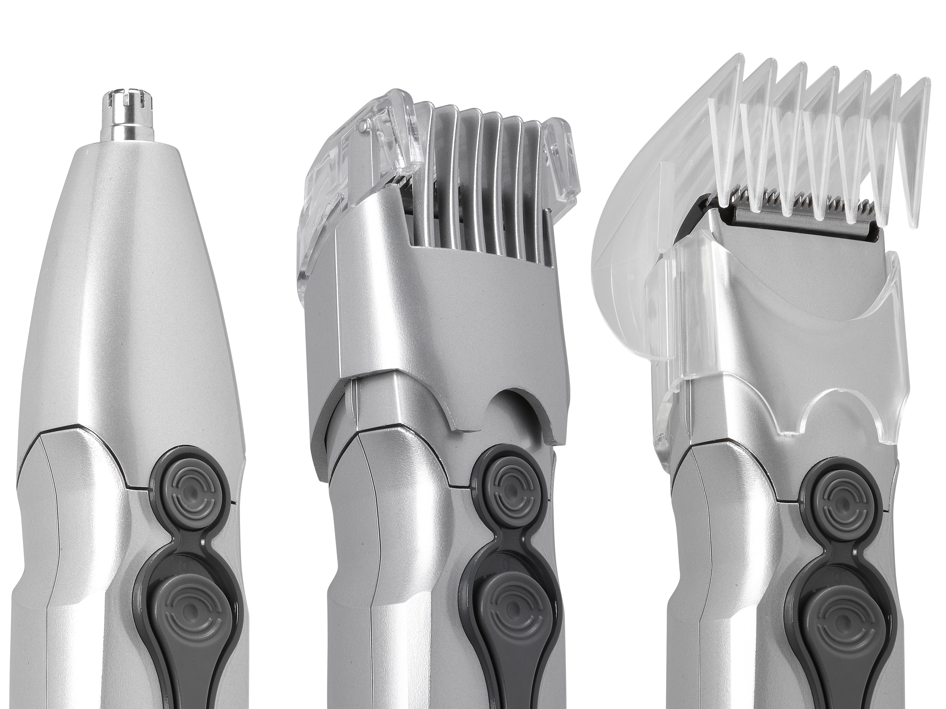 Tre accessori argentati per un dispositivo per la cura della persona: rifinitore nasale, rifinitore per capelli e rifinitore per barba.