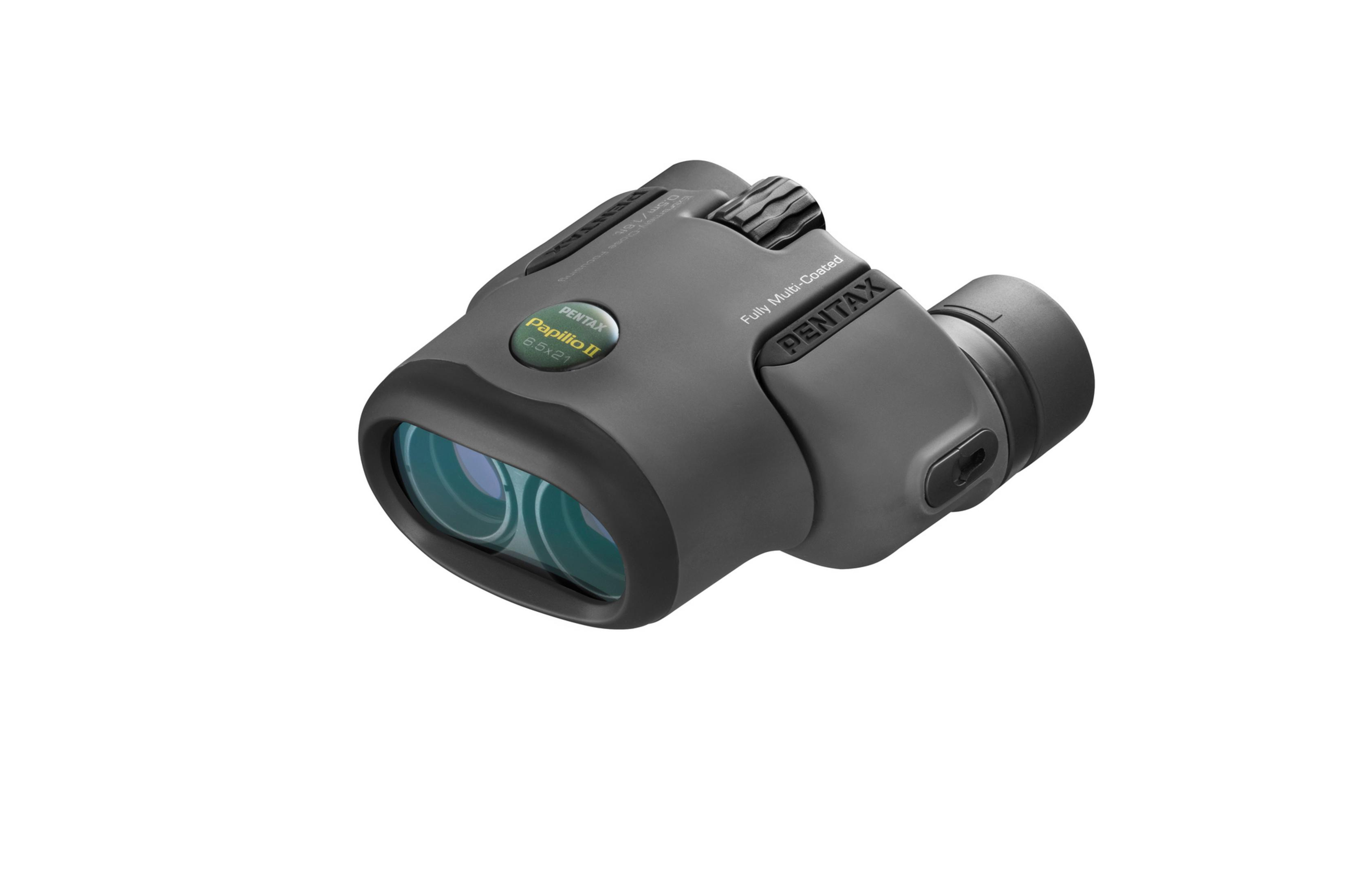 Jumelles noires, corps gris avec texte vert. Sur une surface blanche.