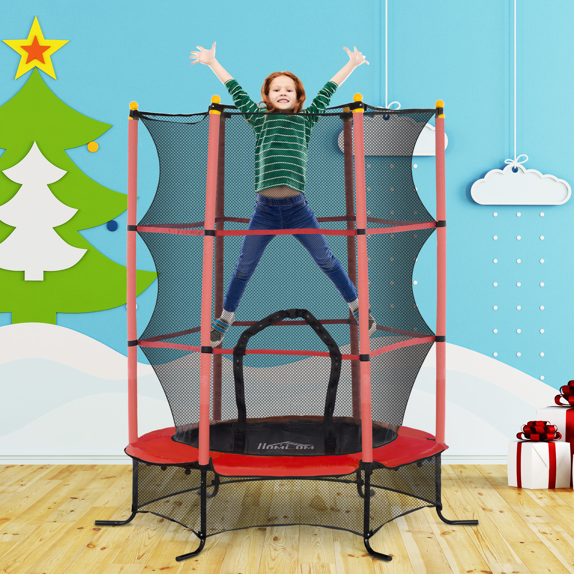 Un bambino salta in un trampolino rosso con un telaio blu. Lo sfondo ha decorazioni natalizie.
