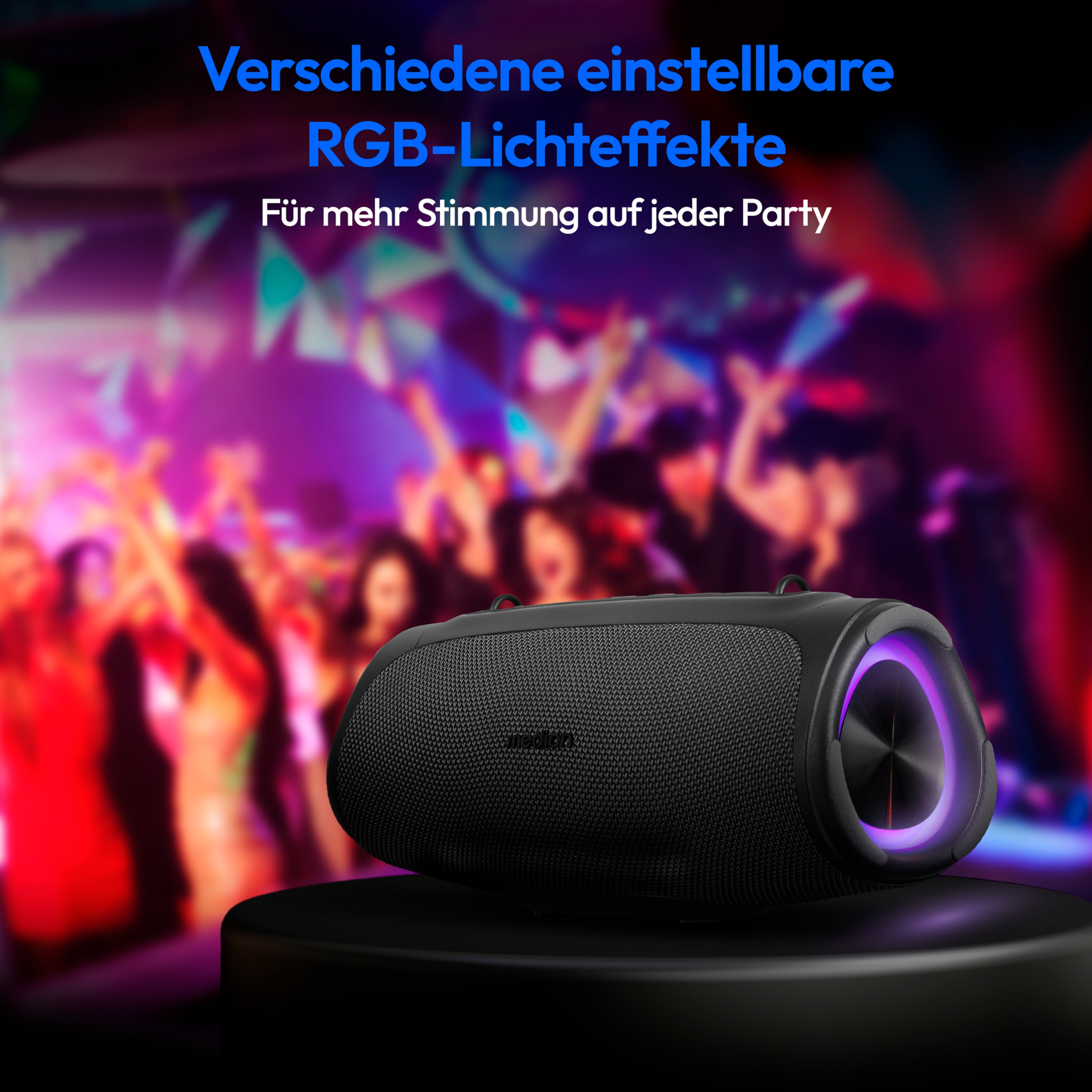 Zwarte speaker met kleurrijke RGB-lichtring, op een donkere achtergrond.