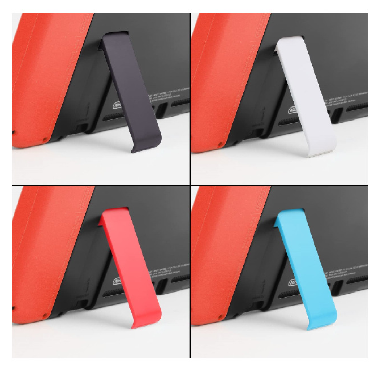 Vier Nintendo Switch consoles met verschillende gekleurde standaards op een wit oppervlak.