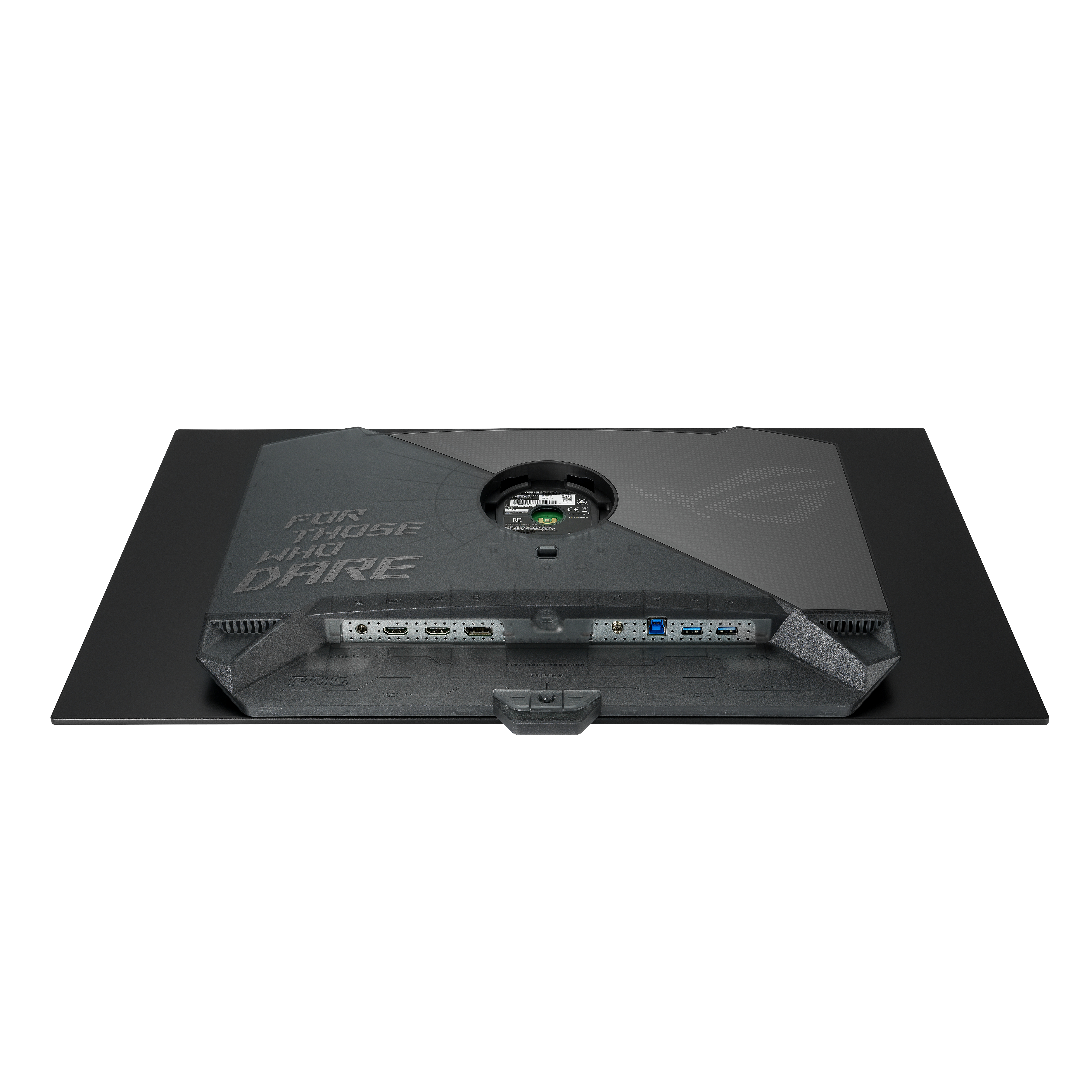 Tył monitora z logo „FOR THOSE WHO DARE” i różnymi portami.