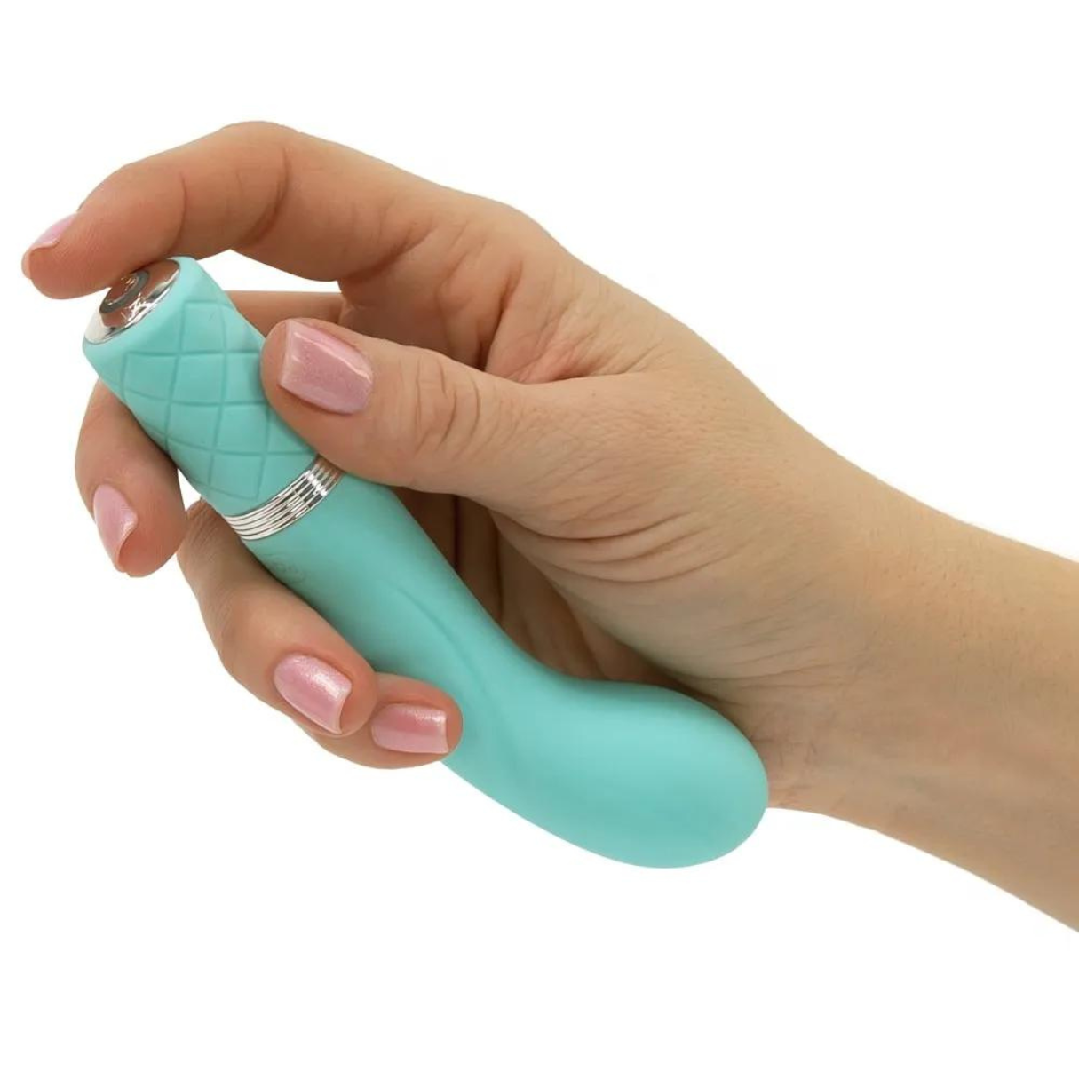 Ein türkisfarbener Vibrator, der von einer Person gehalten wird, mit rosafarbenem Nagellack.