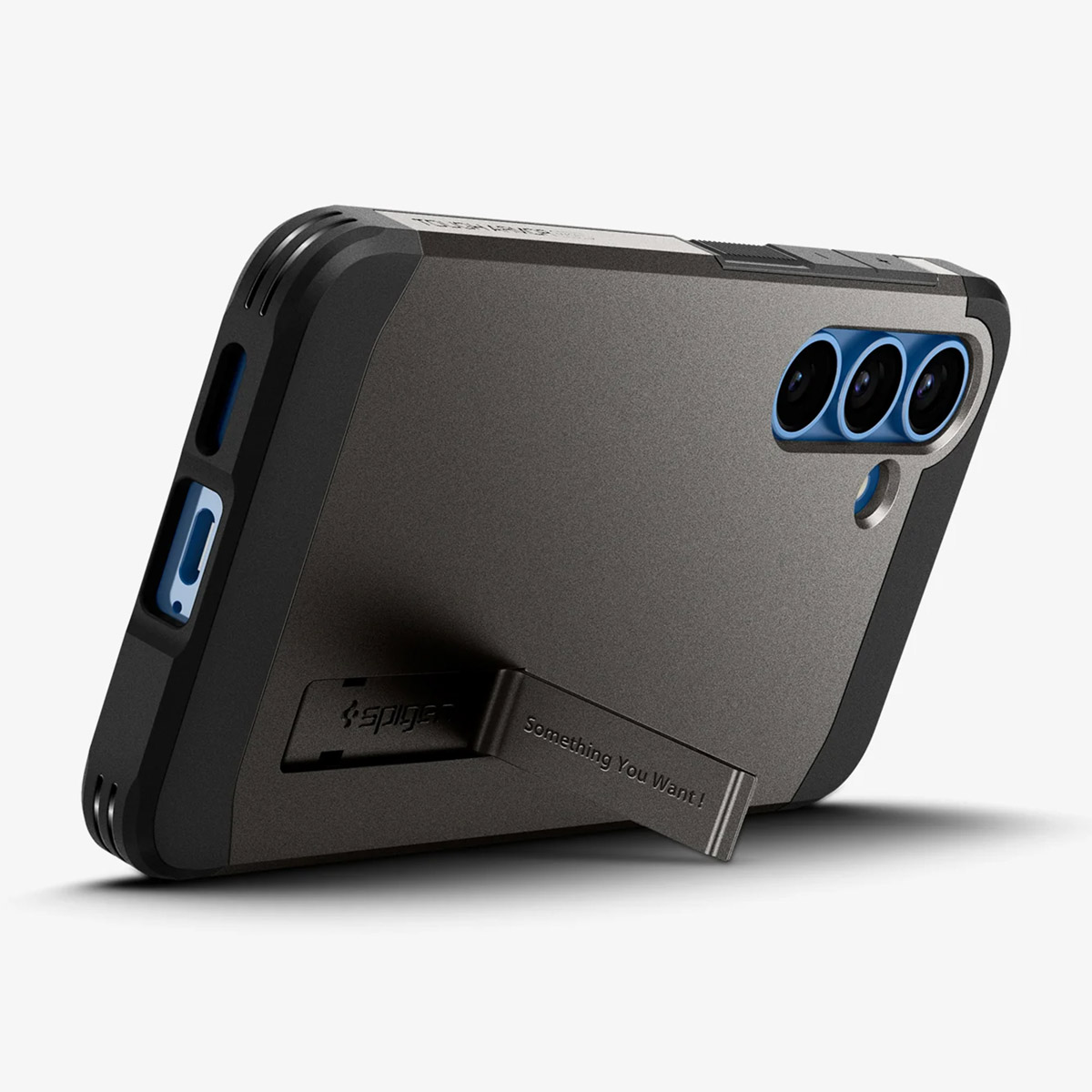 Una custodia per telefono scura con un supporto, con il marchio Spigen e 'Something You Want!'.
