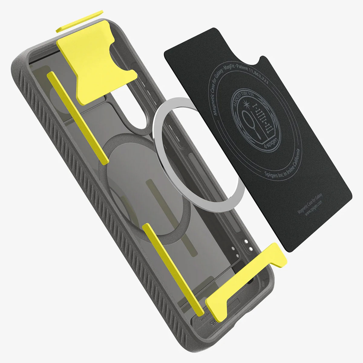 Vue éclatée d'une coque de téléphone, d'un anneau magnétique et d'une carte noire. Accents jaunes.