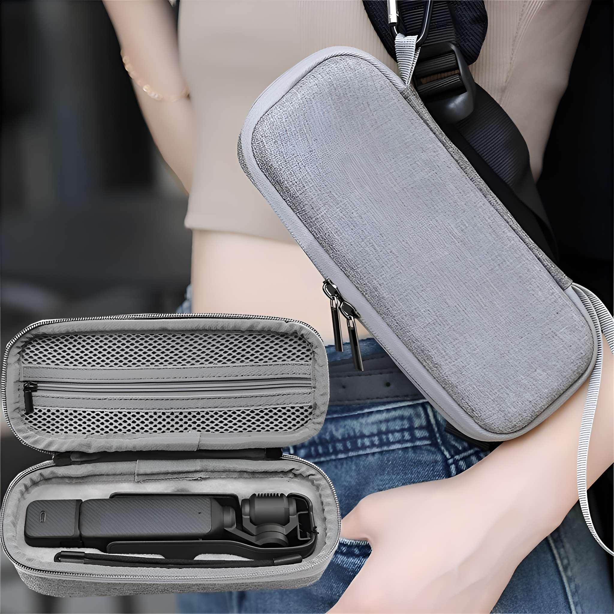 Grauer Koffer mit Gadget, Person im Hintergrund. Jeans sichtbar.