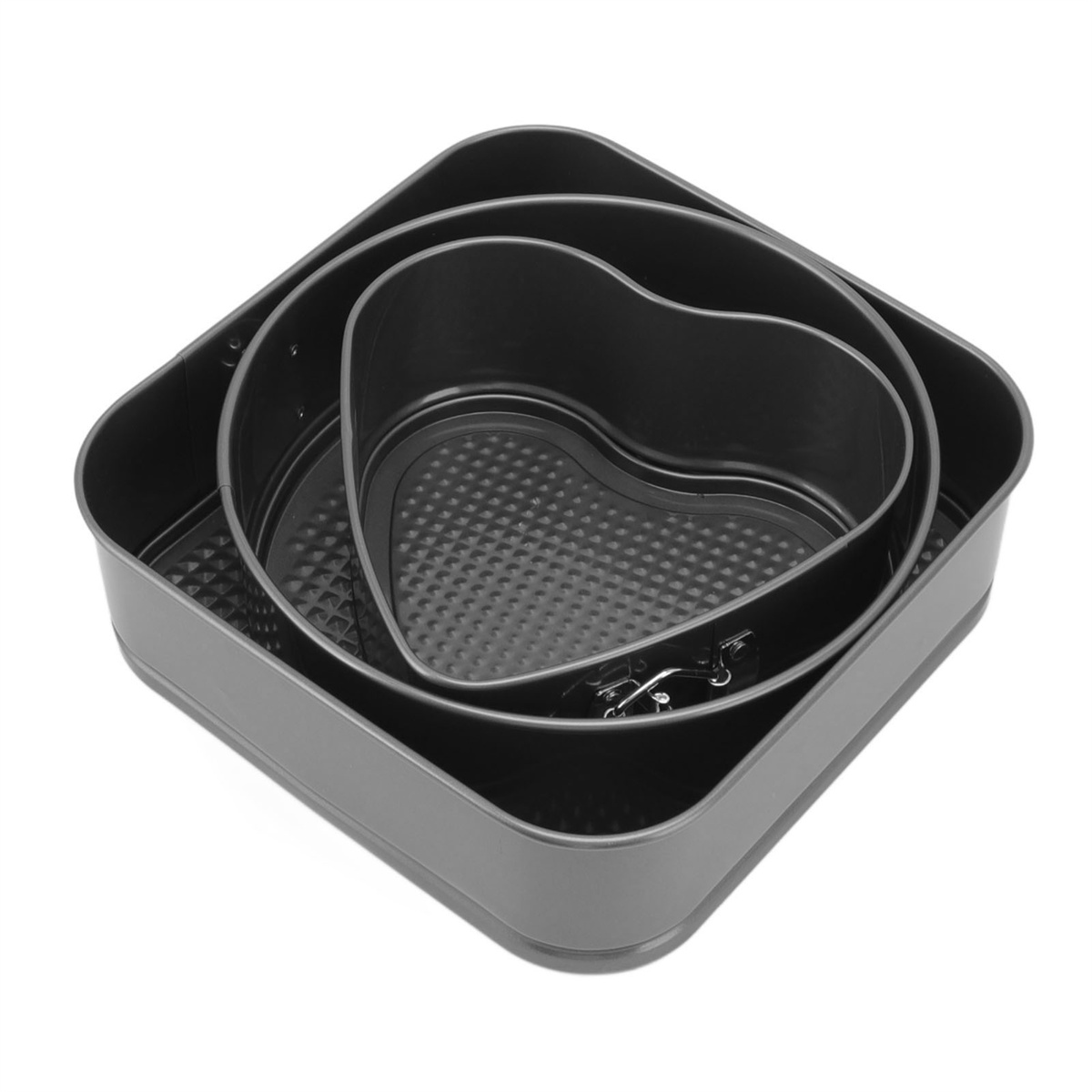 Set aus drei schwarzen Springform-Kuchenformen, eine quadratisch, eine herzförmig, auf weißem Hintergrund.