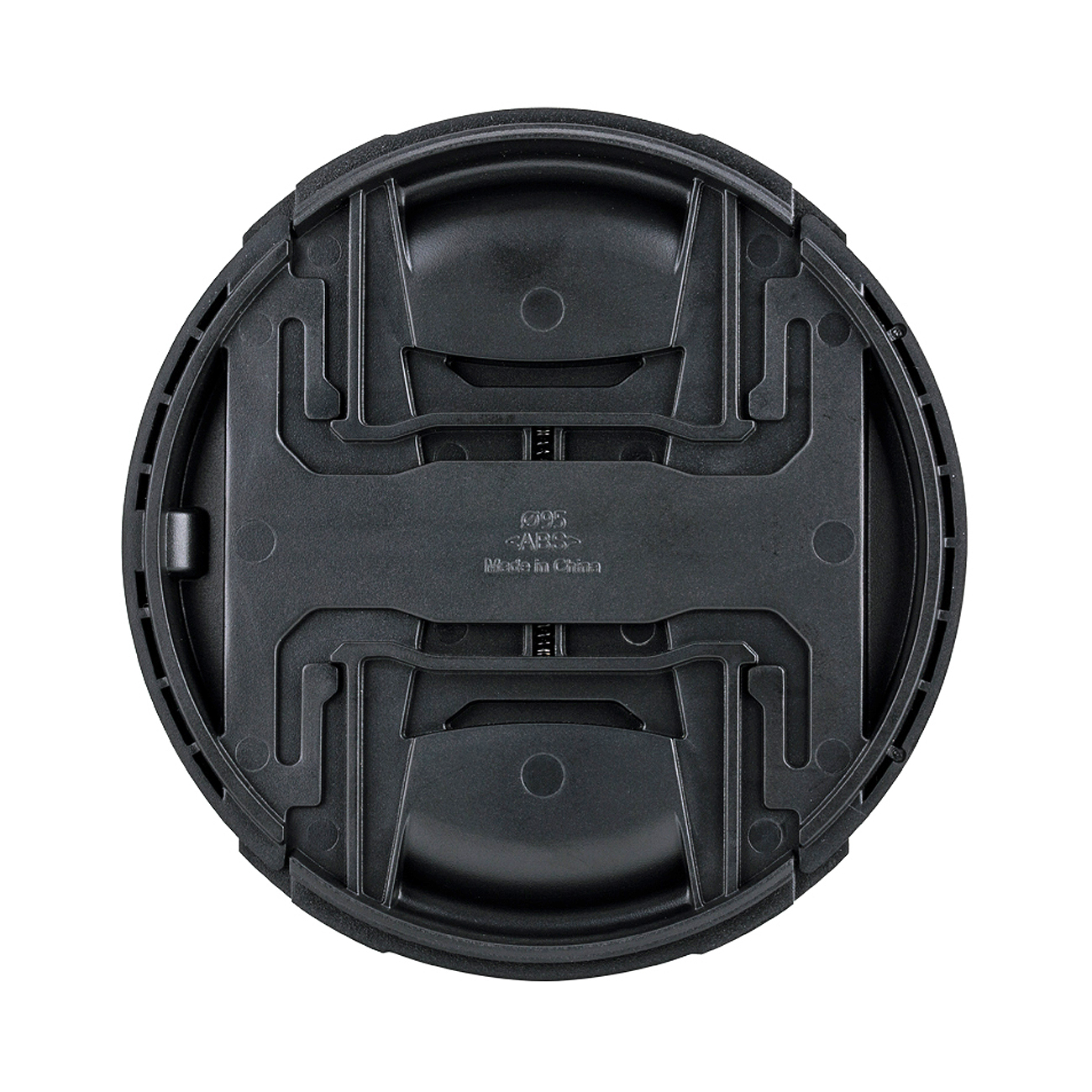 Schwarze Objektivkappe, Innenansicht, mit Text- und Design-Details.