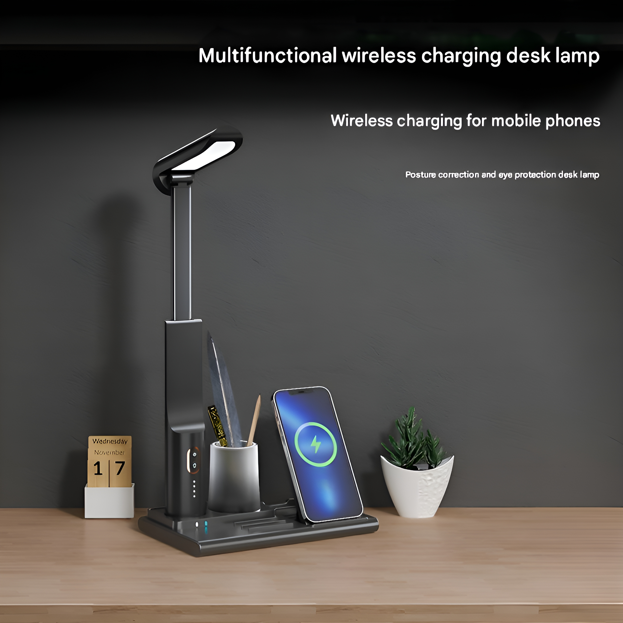 Eine Schreibtischlampe mit Telefon und Kalender.