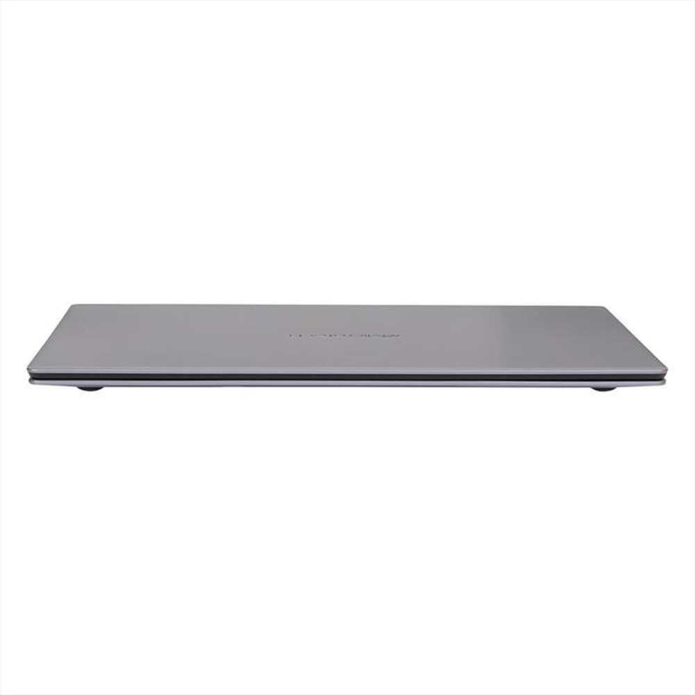 Un laptop grigio chiuso su sfondo bianco. Il laptop è visto lateralmente.