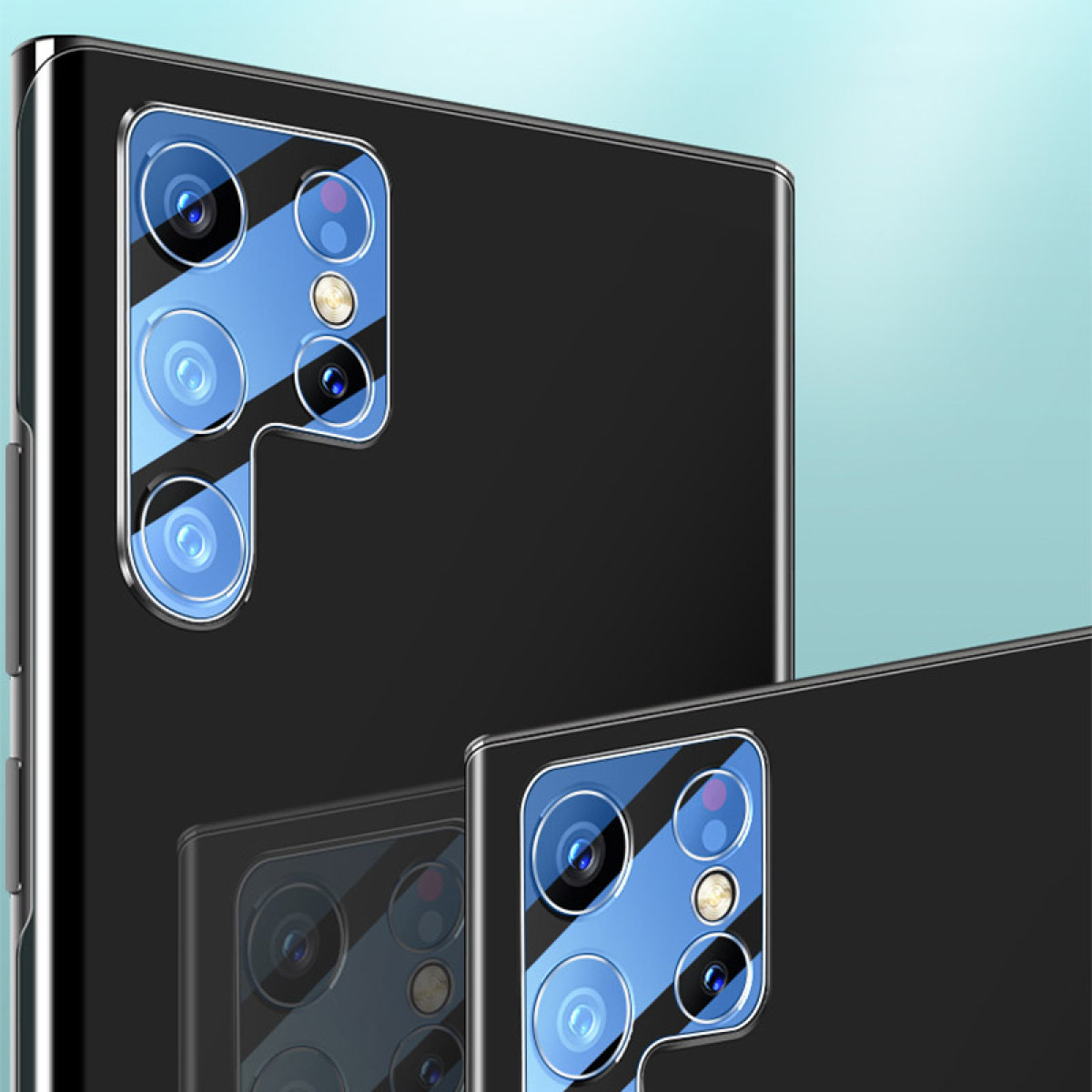 Primo piano di due telefoni cellulari neri con lenti blu della fotocamera.