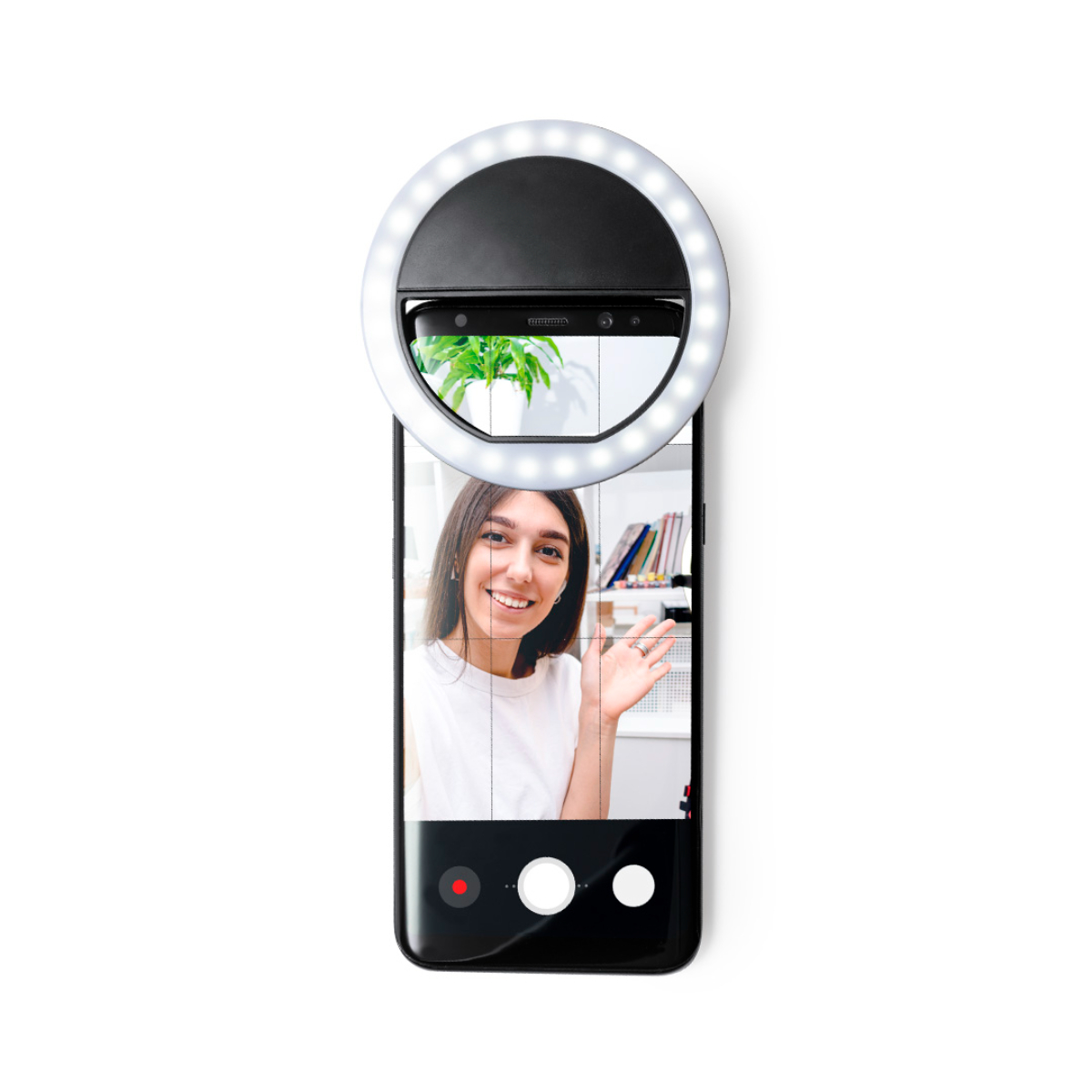 Un smartphone con un anillo de luz adjunto, que muestra a una mujer sonriendo y saludando.